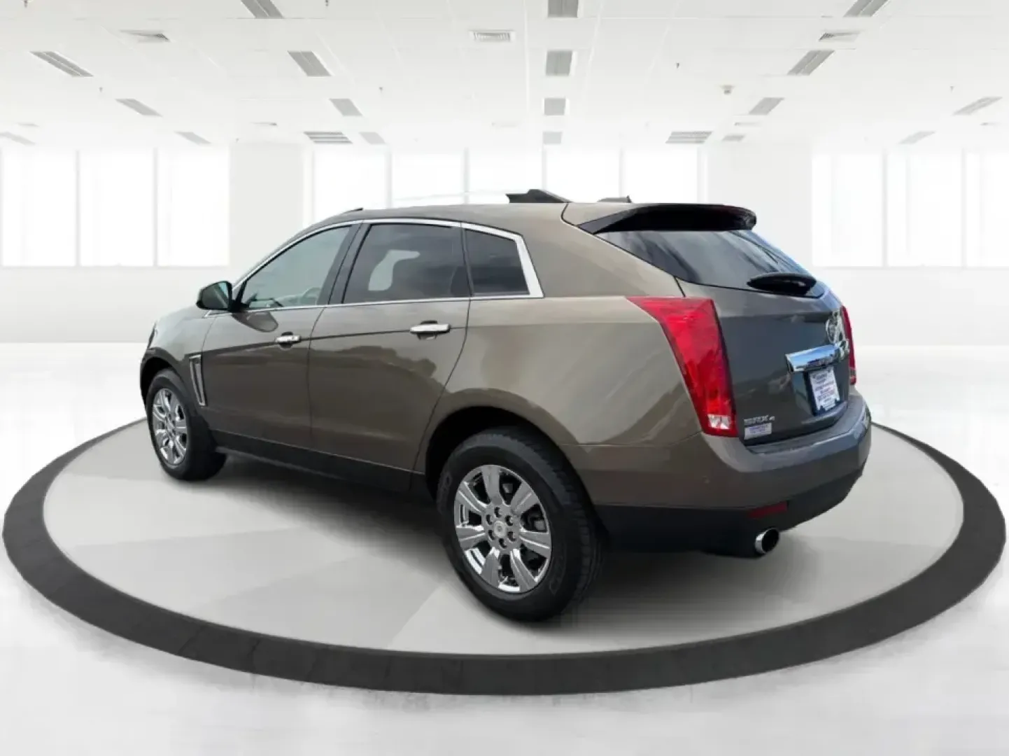 2015 Cadillac SRX Luxury Collection (3GYFNEE39FS) with an 3.6L V-6 gasoline direct injection engine, 6-Speed Automatic transmission, located at 401 Woodman Dr, Riverside, OH, 45431, (937) 908-9800, 39.760899, -84.123421 - Picture your next road trip or daily commute with a touch of luxury: a quiet, confident SUV that feels just as at home cruising I-675 to work as it does loading up for a weekend at Carillon Historical Park or a family day at the National Museum of the U.S. Air Force. This 2015 Cadillac SRX Luxury Co - Photo#4