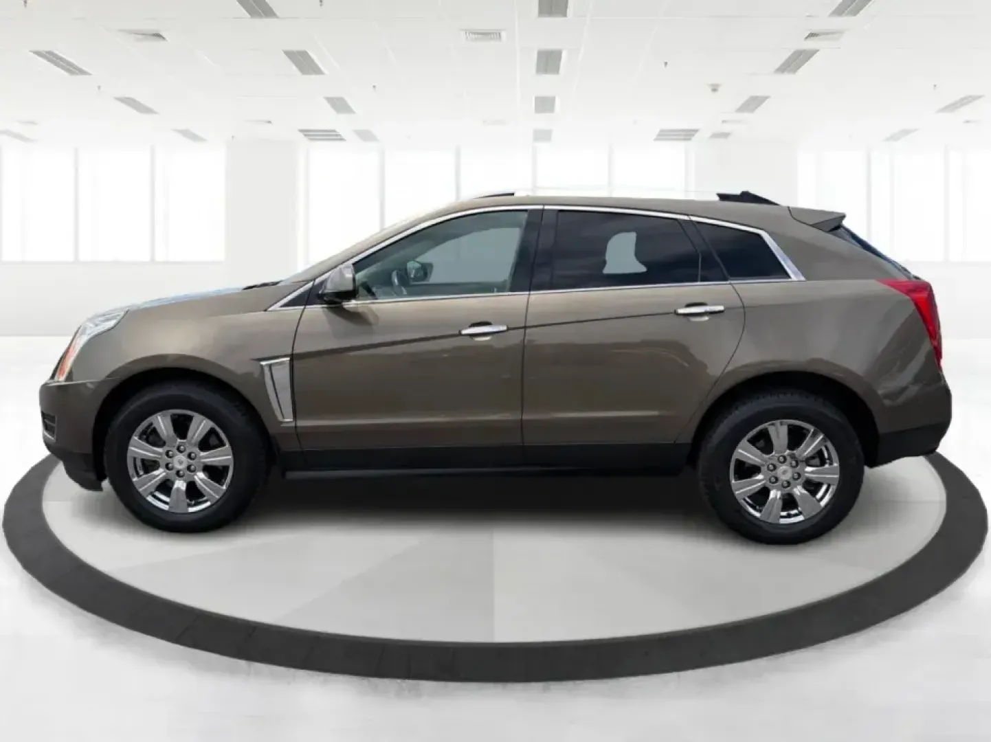 2015 Cadillac SRX Luxury Collection (3GYFNEE39FS) with an 3.6L V-6 gasoline direct injection engine, 6-Speed Automatic transmission, located at 401 Woodman Dr, Riverside, OH, 45431, (937) 908-9800, 39.760899, -84.123421 - Picture your next road trip or daily commute with a touch of luxury: a quiet, confident SUV that feels just as at home cruising I-675 to work as it does loading up for a weekend at Carillon Historical Park or a family day at the National Museum of the U.S. Air Force. This 2015 Cadillac SRX Luxury Co - Photo#5