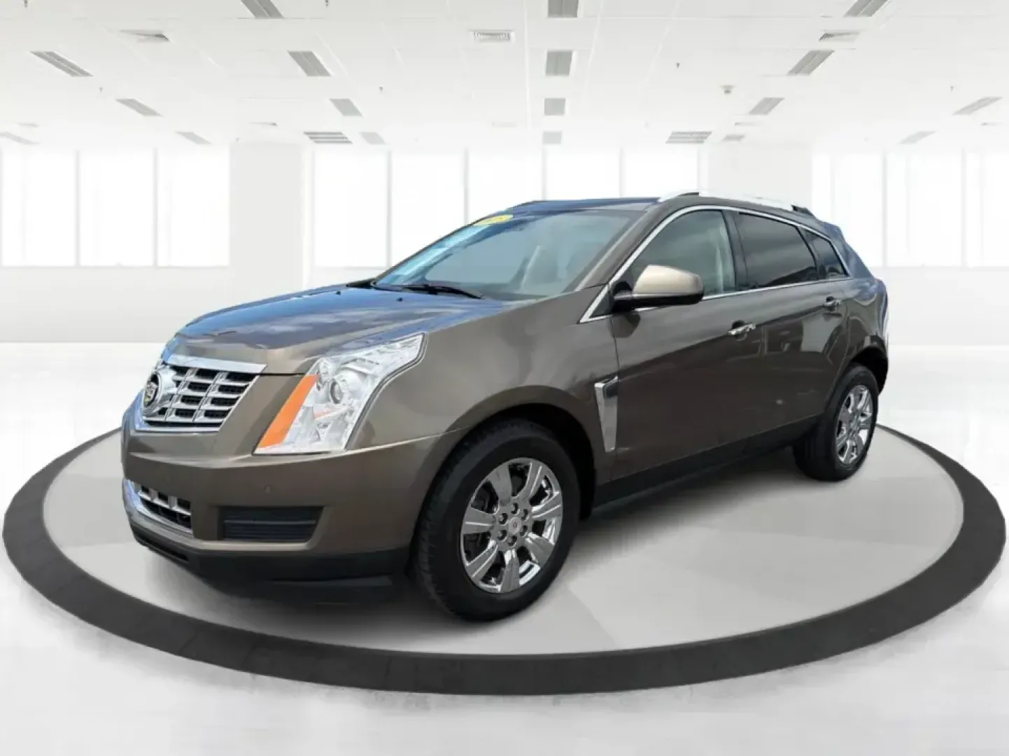 2015 Cadillac SRX Luxury Collection (3GYFNEE39FS) with an 3.6L V-6 gasoline direct injection engine, 6-Speed Automatic transmission, located at 401 Woodman Dr, Riverside, OH, 45431, (937) 908-9800, 39.760899, -84.123421 - Picture your next road trip or daily commute with a touch of luxury: a quiet, confident SUV that feels just as at home cruising I-675 to work as it does loading up for a weekend at Carillon Historical Park or a family day at the National Museum of the U.S. Air Force. This 2015 Cadillac SRX Luxury Co - Photo#8