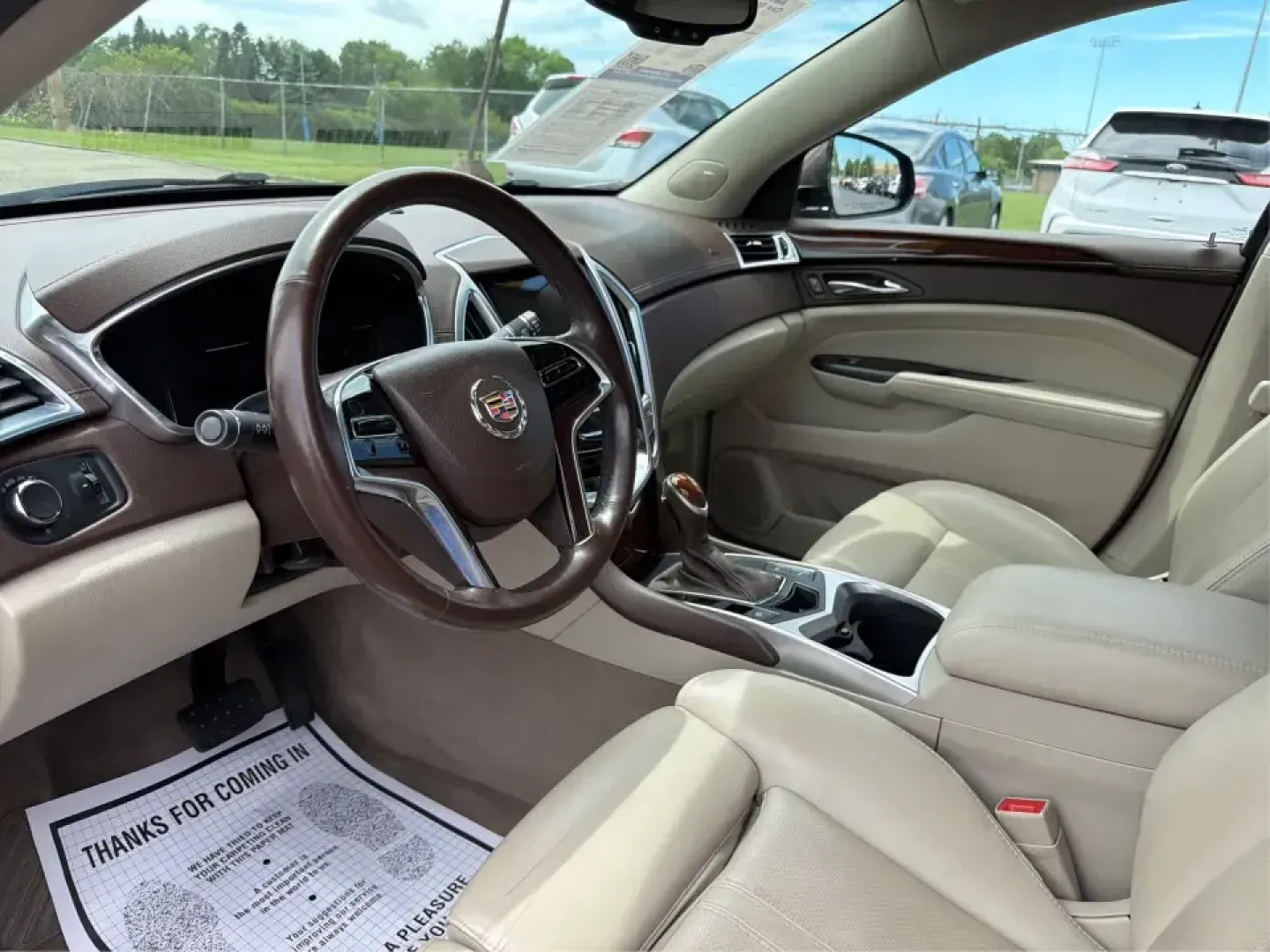 2015 Cadillac SRX Luxury Collection (3GYFNEE39FS) with an 3.6L V-6 gasoline direct injection engine, 6-Speed Automatic transmission, located at 401 Woodman Dr, Riverside, OH, 45431, (937) 908-9800, 39.760899, -84.123421 - Picture your next road trip or daily commute with a touch of luxury: a quiet, confident SUV that feels just as at home cruising I-675 to work as it does loading up for a weekend at Carillon Historical Park or a family day at the National Museum of the U.S. Air Force. This 2015 Cadillac SRX Luxury Co - Photo#9