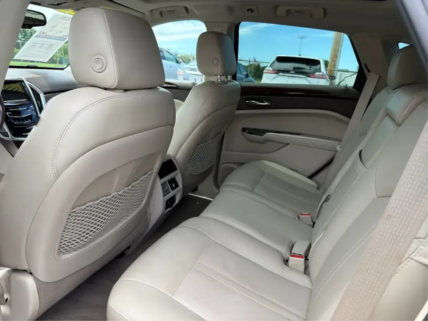 2015 Cadillac SRX Luxury Collection (3GYFNEE39FS) with an 3.6L V-6 gasoline direct injection engine, 6-Speed Automatic transmission, located at 401 Woodman Dr, Riverside, OH, 45431, (937) 908-9800, 39.760899, -84.123421 - Picture your next road trip or daily commute with a touch of luxury: a quiet, confident SUV that feels just as at home cruising I-675 to work as it does loading up for a weekend at Carillon Historical Park or a family day at the National Museum of the U.S. Air Force. This 2015 Cadillac SRX Luxury Co - Photo#10