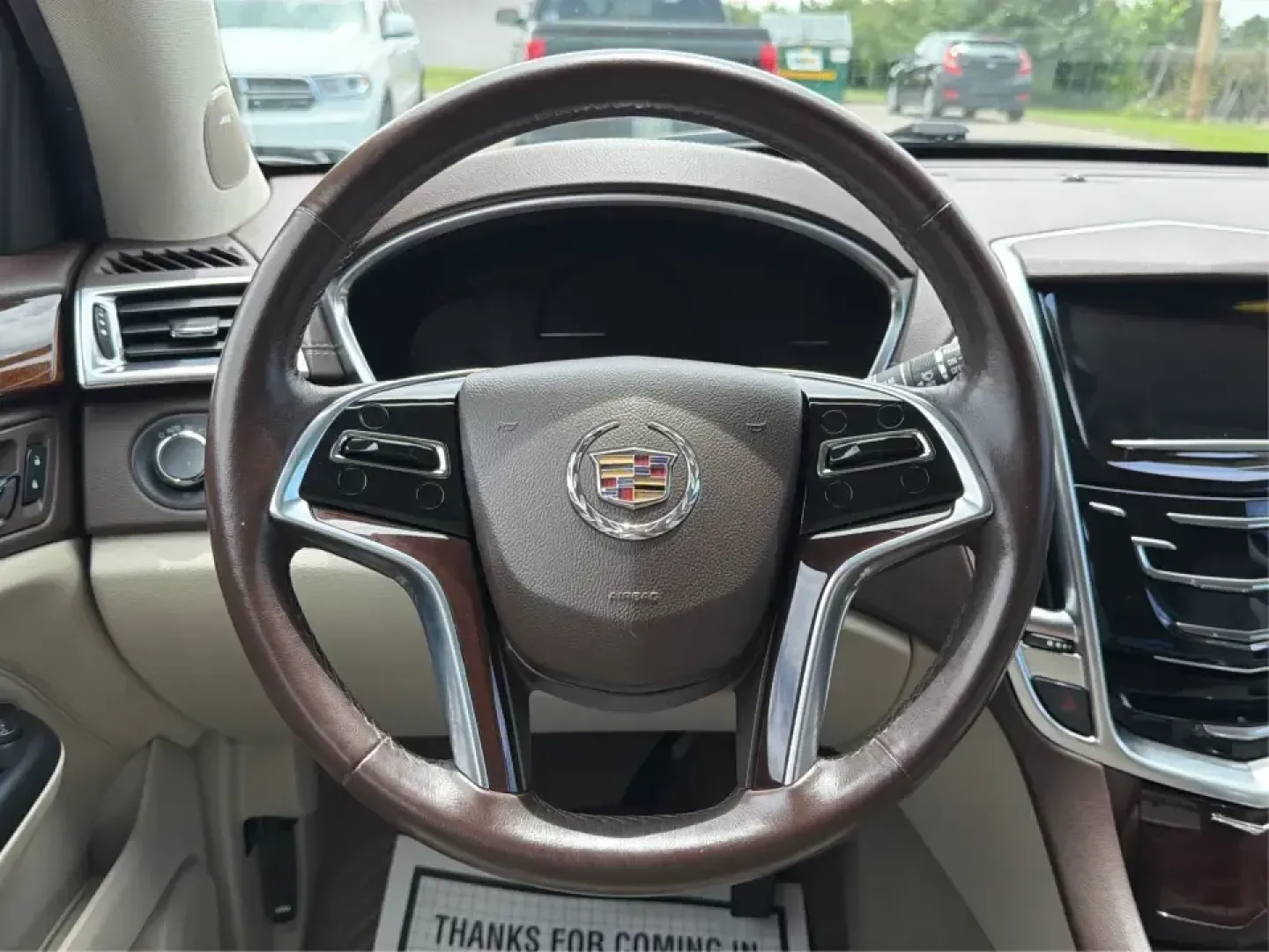 2015 Cadillac SRX Luxury Collection (3GYFNEE39FS) with an 3.6L V-6 gasoline direct injection engine, 6-Speed Automatic transmission, located at 401 Woodman Dr, Riverside, OH, 45431, (937) 908-9800, 39.760899, -84.123421 - Picture your next road trip or daily commute with a touch of luxury: a quiet, confident SUV that feels just as at home cruising I-675 to work as it does loading up for a weekend at Carillon Historical Park or a family day at the National Museum of the U.S. Air Force. This 2015 Cadillac SRX Luxury Co - Photo#16