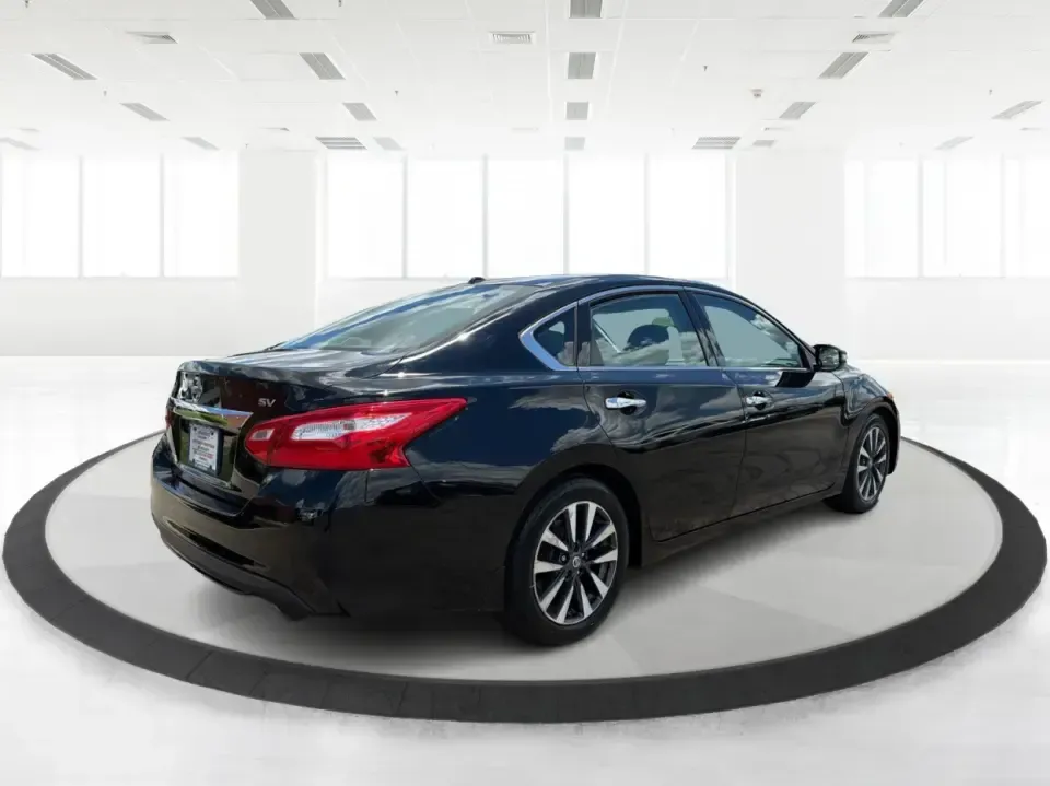 2017 Nissan Altima 2.5 S (1N4AL3AP8HC) with an 2.5L L4 DOHC 16V engine, CVT transmission, located at 4508 South Dixie Dr, Moraine, OH, 45439, (937) 908-9800, 39.689976, -84.218452 - Need a reliable daily driver for I-75 commutes, Wright-Patterson AFB runs, or quick family errands around Dayton? This 2017 Nissan Altima 2.5 SV in Super Black is a smart, comfortable sedan that fits real life in Moraine-easy to park, efficient to live with, and roomy enough for carpools, groceries, - Photo#2