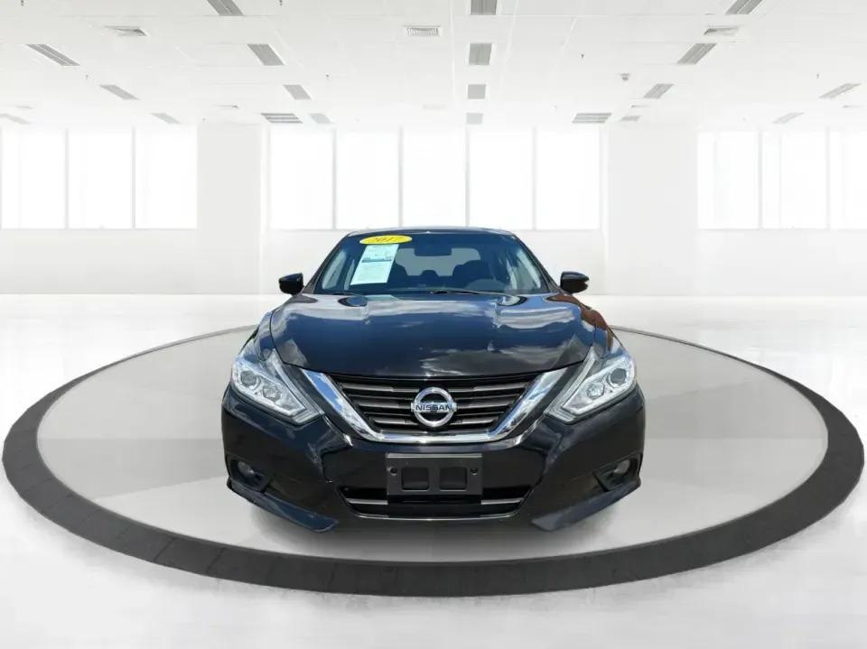 2017 Nissan Altima 2.5 S (1N4AL3AP8HC) with an 2.5L L4 DOHC 16V engine, CVT transmission, located at 4508 South Dixie Dr, Moraine, OH, 45439, (937) 908-9800, 39.689976, -84.218452 - Need a reliable daily driver for I-75 commutes, Wright-Patterson AFB runs, or quick family errands around Dayton? This 2017 Nissan Altima 2.5 SV in Super Black is a smart, comfortable sedan that fits real life in Moraine-easy to park, efficient to live with, and roomy enough for carpools, groceries, - Photo#7