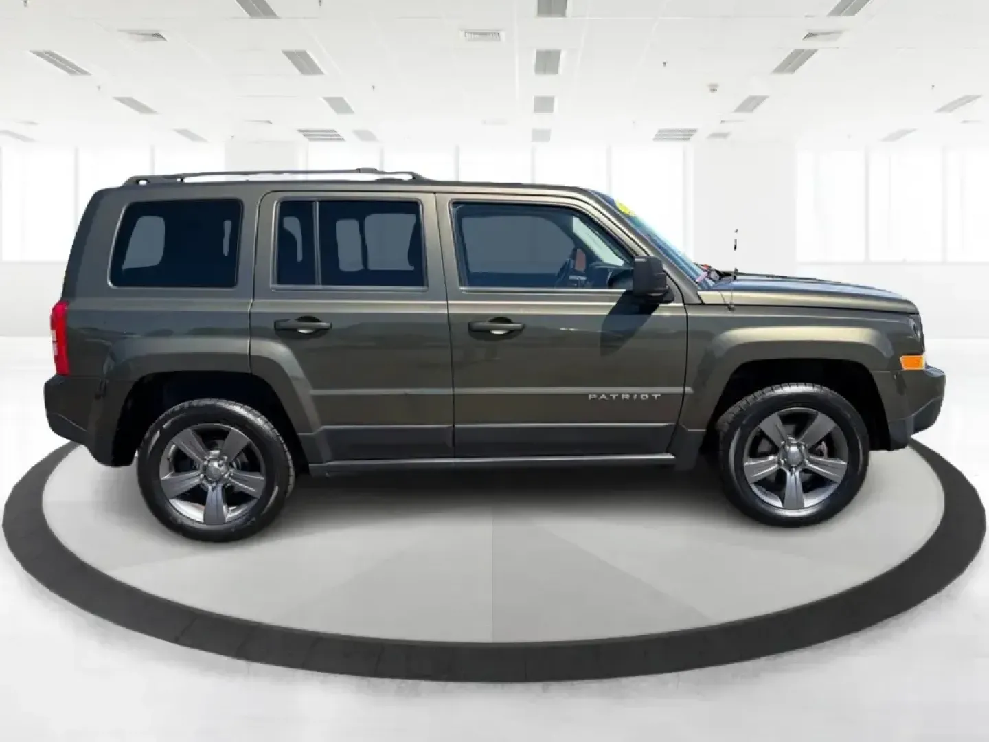 2015 Jeep Patriot Latitude 4WD (1C4NJRFB3FD) with an 2.4L L4 DOHC 16V engine, located at 8750 N County Rd 25A, Piqua, OH, 45356, (937) 908-9800, 40.164391, -84.232513 - When your weekends bounce between soccer fields, grocery runs, and quick getaways to the outdoors, you need an SUV that can handle everyday life without feeling like a chore. This 2015 Jeep Patriot Latitude 4WD is a practical, adventure-ready choice for Piqua-area drivers who want confident traction- Photo#1