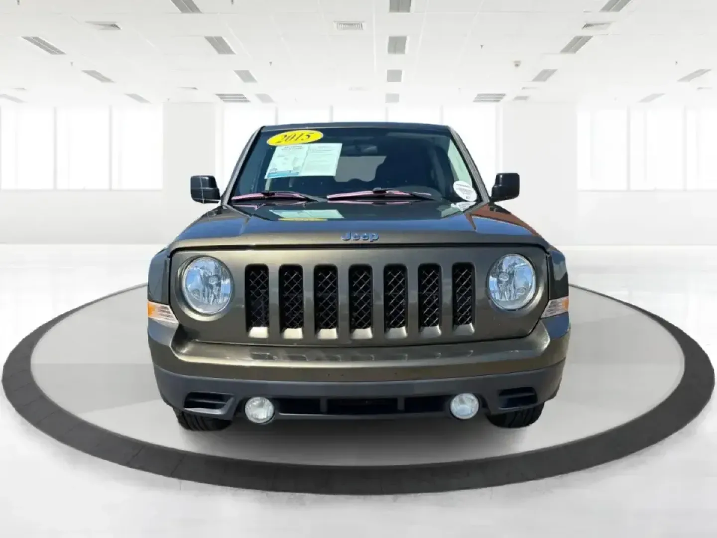 2015 Jeep Patriot Latitude 4WD (1C4NJRFB3FD) with an 2.4L L4 DOHC 16V engine, located at 8750 N County Rd 25A, Piqua, OH, 45356, (937) 908-9800, 40.164391, -84.232513 - When your weekends bounce between soccer fields, grocery runs, and quick getaways to the outdoors, you need an SUV that can handle everyday life without feeling like a chore. This 2015 Jeep Patriot Latitude 4WD is a practical, adventure-ready choice for Piqua-area drivers who want confident traction- Photo#7