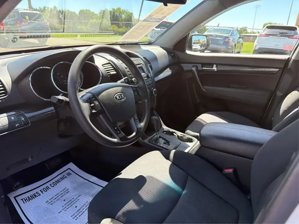 2013 Kia Sorento LX (5XYKT3A17DG) with an 2.4L I-4 DOHC engine, 6-Speed Automatic transmission, located at 401 Woodman Dr, Riverside, OH, 45431, (937) 908-9800, 39.760899, -84.123421 - Pack up the kids, load the groceries, or point the GPS toward a weekend getaway-this 2013 Kia Sorento LX is the kind of practical SUV that fits real life in Riverside, Ohio. With confident road manners for daily commuting and flexible space for road trips, it's a smart choice for growing families, b - Photo#9