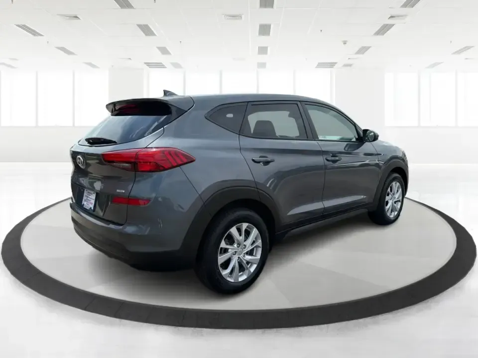 2019 Hyundai Tucson SE AWD (KM8J2CA47KU) with an 2.0L L4 DOHC 16V engine, 6A transmission, located at 1099 N County Rd 25A , Troy, OH, 45373, (937) 908-9800, 40.057079, -84.212883 - Need a dependable SUV that can handle school drop-offs, long commutes up I-75, and spontaneous weekend getaways to Charleston Falls Preserve or a quick lap around the Miami County Fairgrounds? This 2019 Hyundai Tucson SE in Coliseum Gray is a smart, practical choice for drivers who want confident al - Photo#2