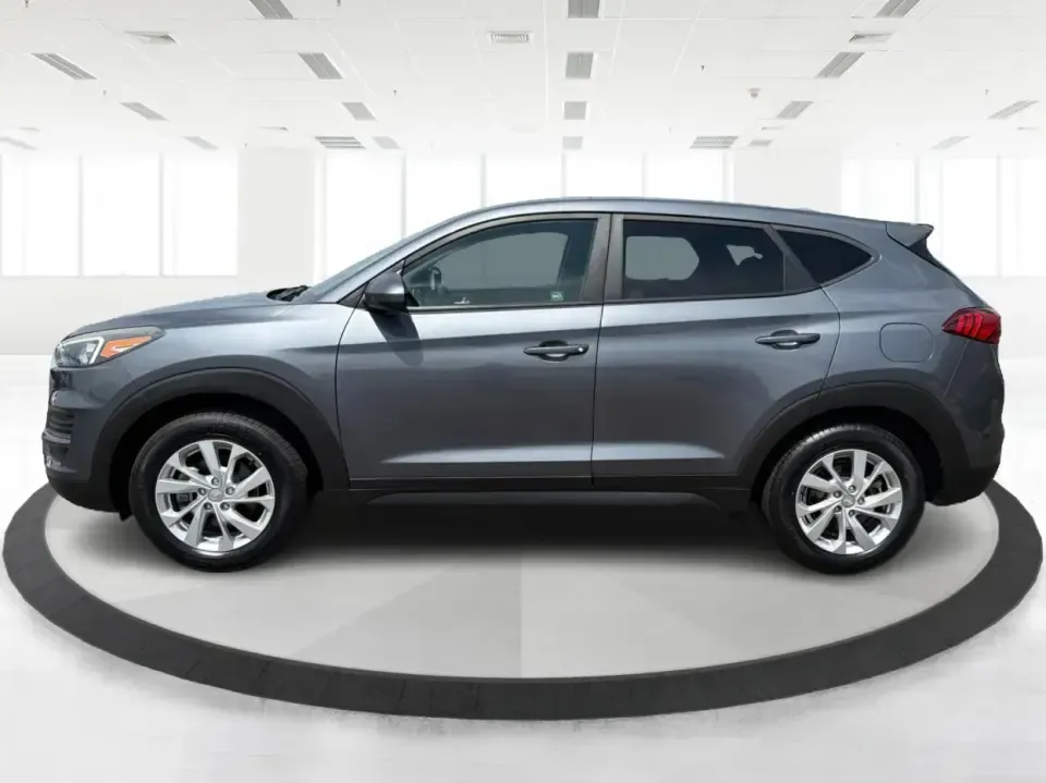 2019 Hyundai Tucson SE AWD (KM8J2CA47KU) with an 2.0L L4 DOHC 16V engine, 6A transmission, located at 1099 N County Rd 25A , Troy, OH, 45373, (937) 908-9800, 40.057079, -84.212883 - Need a dependable SUV that can handle school drop-offs, long commutes up I-75, and spontaneous weekend getaways to Charleston Falls Preserve or a quick lap around the Miami County Fairgrounds? This 2019 Hyundai Tucson SE in Coliseum Gray is a smart, practical choice for drivers who want confident al - Photo#5