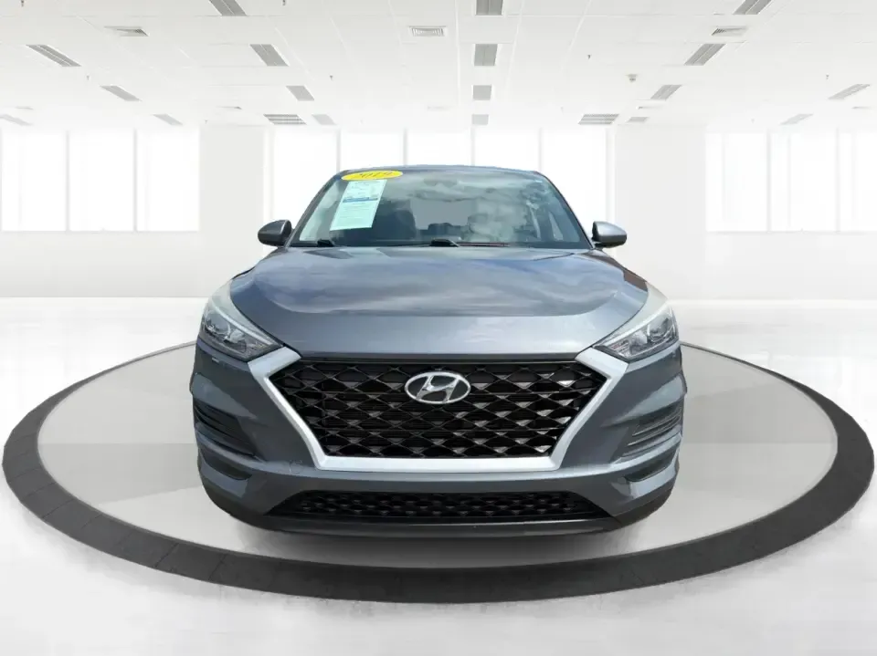 2019 Hyundai Tucson SE AWD (KM8J2CA47KU) with an 2.0L L4 DOHC 16V engine, 6A transmission, located at 1099 N County Rd 25A , Troy, OH, 45373, (937) 908-9800, 40.057079, -84.212883 - Need a dependable SUV that can handle school drop-offs, long commutes up I-75, and spontaneous weekend getaways to Charleston Falls Preserve or a quick lap around the Miami County Fairgrounds? This 2019 Hyundai Tucson SE in Coliseum Gray is a smart, practical choice for drivers who want confident al - Photo#7