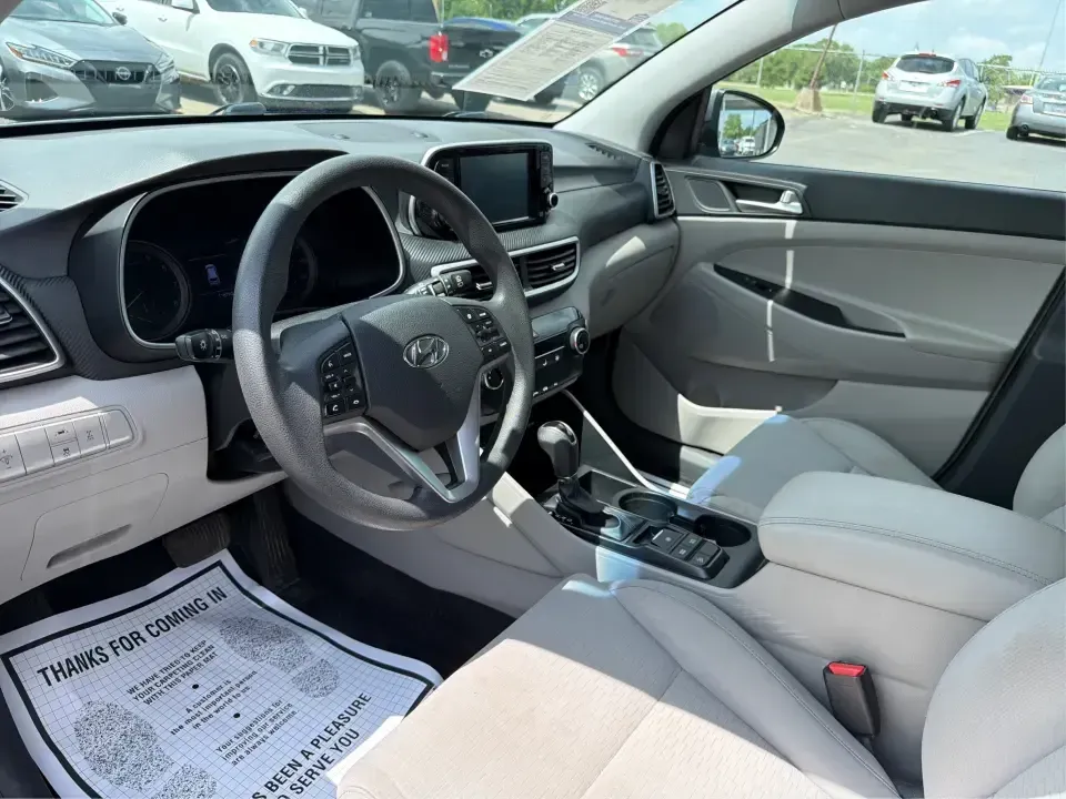 2019 Hyundai Tucson SE AWD (KM8J2CA47KU) with an 2.0L L4 DOHC 16V engine, 6A transmission, located at 1099 N County Rd 25A , Troy, OH, 45373, (937) 908-9800, 40.057079, -84.212883 - Need a dependable SUV that can handle school drop-offs, long commutes up I-75, and spontaneous weekend getaways to Charleston Falls Preserve or a quick lap around the Miami County Fairgrounds? This 2019 Hyundai Tucson SE in Coliseum Gray is a smart, practical choice for drivers who want confident al - Photo#9