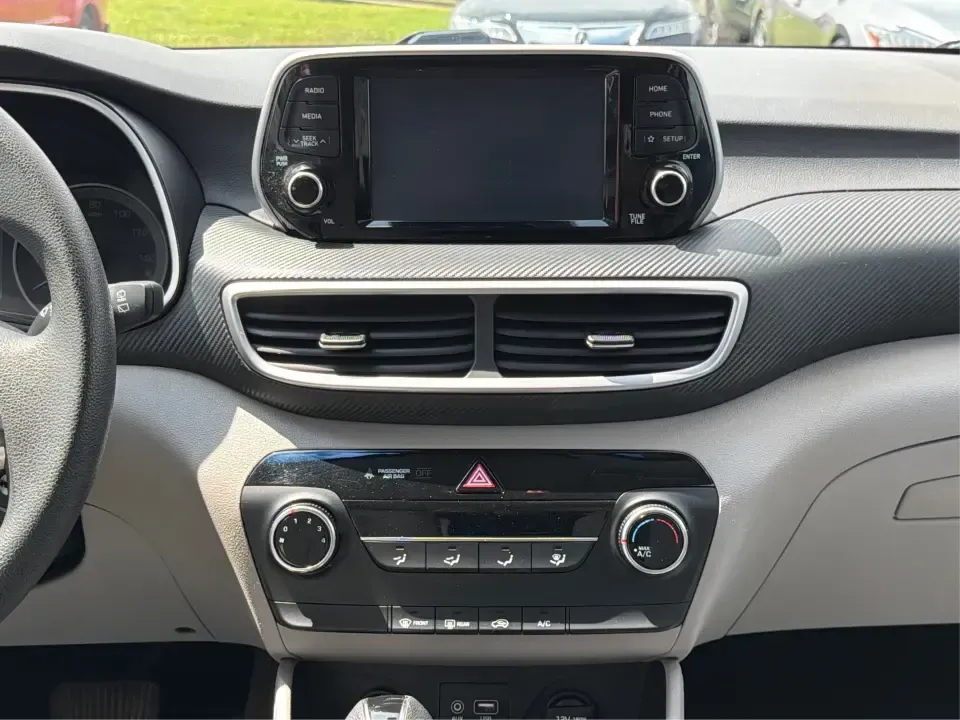 2019 Hyundai Tucson SE AWD (KM8J2CA47KU) with an 2.0L L4 DOHC 16V engine, 6A transmission, located at 1099 N County Rd 25A , Troy, OH, 45373, (937) 908-9800, 40.057079, -84.212883 - Need a dependable SUV that can handle school drop-offs, long commutes up I-75, and spontaneous weekend getaways to Charleston Falls Preserve or a quick lap around the Miami County Fairgrounds? This 2019 Hyundai Tucson SE in Coliseum Gray is a smart, practical choice for drivers who want confident al - Photo#13