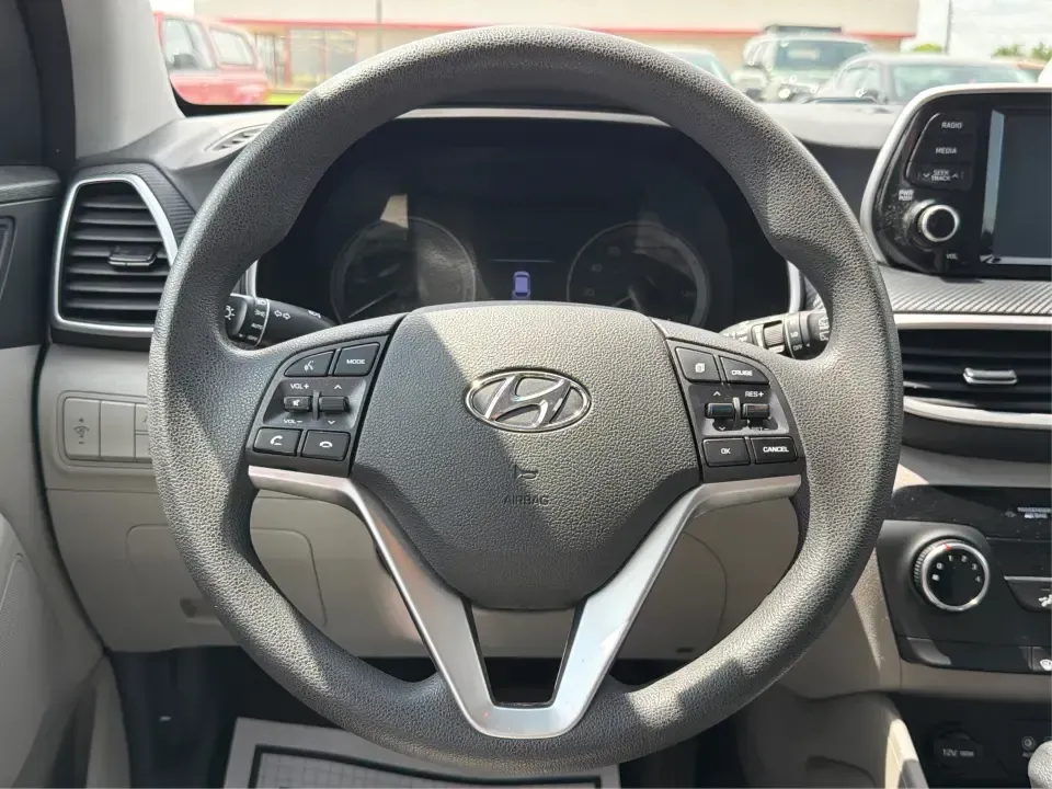 2019 Hyundai Tucson SE AWD (KM8J2CA47KU) with an 2.0L L4 DOHC 16V engine, 6A transmission, located at 1099 N County Rd 25A , Troy, OH, 45373, (937) 908-9800, 40.057079, -84.212883 - Need a dependable SUV that can handle school drop-offs, long commutes up I-75, and spontaneous weekend getaways to Charleston Falls Preserve or a quick lap around the Miami County Fairgrounds? This 2019 Hyundai Tucson SE in Coliseum Gray is a smart, practical choice for drivers who want confident al - Photo#16