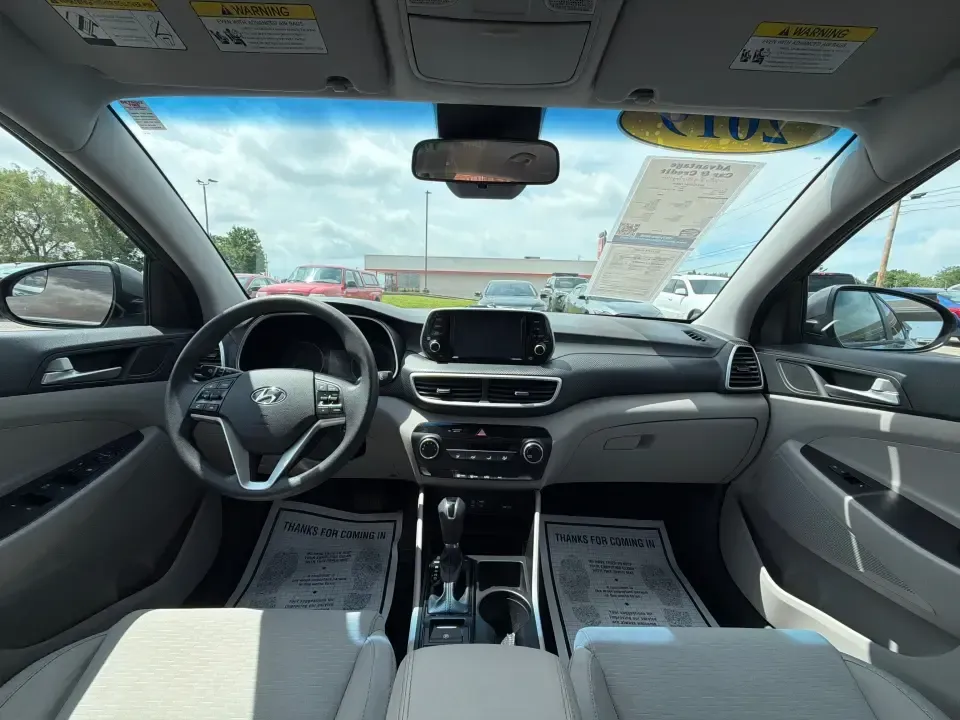 2019 Hyundai Tucson SE AWD (KM8J2CA47KU) with an 2.0L L4 DOHC 16V engine, 6A transmission, located at 1099 N County Rd 25A , Troy, OH, 45373, (937) 908-9800, 40.057079, -84.212883 - Need a dependable SUV that can handle school drop-offs, long commutes up I-75, and spontaneous weekend getaways to Charleston Falls Preserve or a quick lap around the Miami County Fairgrounds? This 2019 Hyundai Tucson SE in Coliseum Gray is a smart, practical choice for drivers who want confident al - Photo#20
