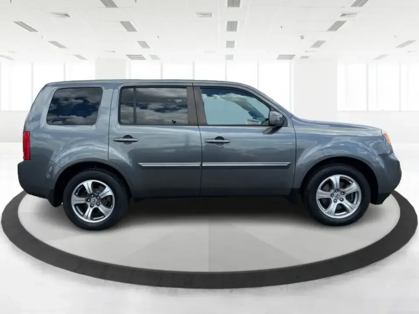 2012 Honda Pilot EX 4WD 5-Spd AT (5FNYF4H46CB) with an 3.5L V6 SOHC 24V engine, 5-Speed Automatic transmission, located at 401 Woodman Dr, Riverside, OH, 45431, (937) 908-9800, 39.760899, -84.123421 - Picture your next Ohio weekend: the kids packed up, coolers in the back, and plenty of room for friends-then cruising from Piqua to Indian Lake or over to Dayton without feeling cramped. This 2012 Honda Pilot EX 4WD is built for real life, whether you're tackling school drop-offs, long commutes on I - Photo#1