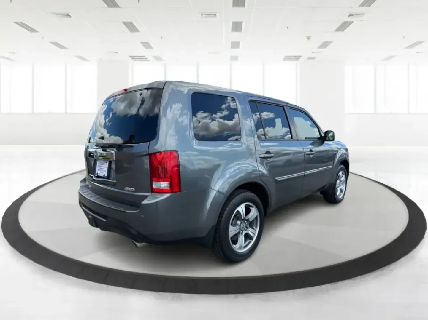 2012 Honda Pilot EX 4WD 5-Spd AT (5FNYF4H46CB) with an 3.5L V6 SOHC 24V engine, 5-Speed Automatic transmission, located at 401 Woodman Dr, Riverside, OH, 45431, (937) 908-9800, 39.760899, -84.123421 - Picture your next Ohio weekend: the kids packed up, coolers in the back, and plenty of room for friends-then cruising from Piqua to Indian Lake or over to Dayton without feeling cramped. This 2012 Honda Pilot EX 4WD is built for real life, whether you're tackling school drop-offs, long commutes on I - Photo#2