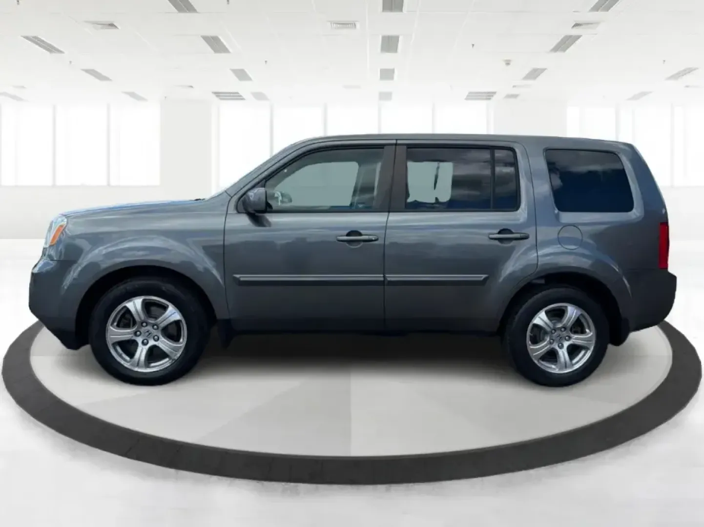 2012 Honda Pilot EX 4WD 5-Spd AT (5FNYF4H46CB) with an 3.5L V6 SOHC 24V engine, 5-Speed Automatic transmission, located at 401 Woodman Dr, Riverside, OH, 45431, (937) 908-9800, 39.760899, -84.123421 - Picture your next Ohio weekend: the kids packed up, coolers in the back, and plenty of room for friends-then cruising from Piqua to Indian Lake or over to Dayton without feeling cramped. This 2012 Honda Pilot EX 4WD is built for real life, whether you're tackling school drop-offs, long commutes on I - Photo#5