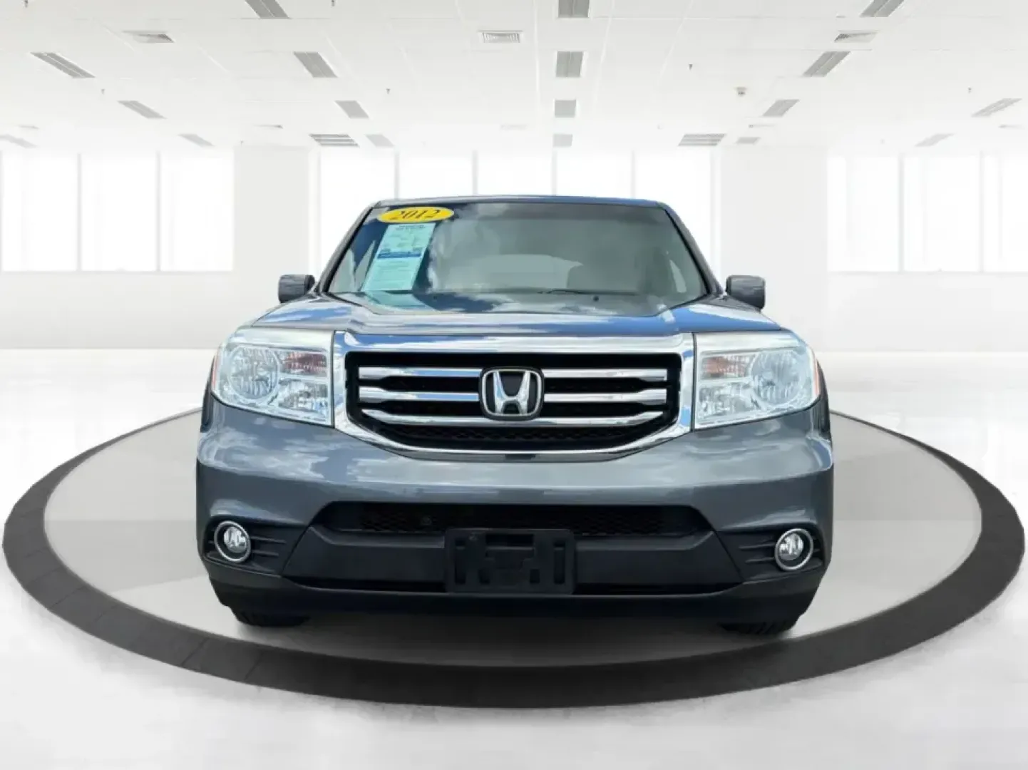 2012 Honda Pilot EX 4WD 5-Spd AT (5FNYF4H46CB) with an 3.5L V6 SOHC 24V engine, 5-Speed Automatic transmission, located at 401 Woodman Dr, Riverside, OH, 45431, (937) 908-9800, 39.760899, -84.123421 - Picture your next Ohio weekend: the kids packed up, coolers in the back, and plenty of room for friends-then cruising from Piqua to Indian Lake or over to Dayton without feeling cramped. This 2012 Honda Pilot EX 4WD is built for real life, whether you're tackling school drop-offs, long commutes on I - Photo#7