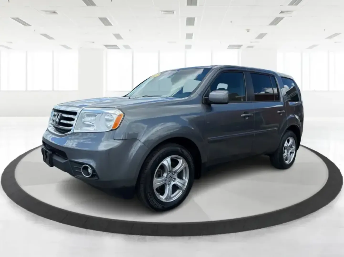 2012 Honda Pilot EX 4WD 5-Spd AT (5FNYF4H46CB) with an 3.5L V6 SOHC 24V engine, 5-Speed Automatic transmission, located at 401 Woodman Dr, Riverside, OH, 45431, (937) 908-9800, 39.760899, -84.123421 - Picture your next Ohio weekend: the kids packed up, coolers in the back, and plenty of room for friends-then cruising from Piqua to Indian Lake or over to Dayton without feeling cramped. This 2012 Honda Pilot EX 4WD is built for real life, whether you're tackling school drop-offs, long commutes on I - Photo#8