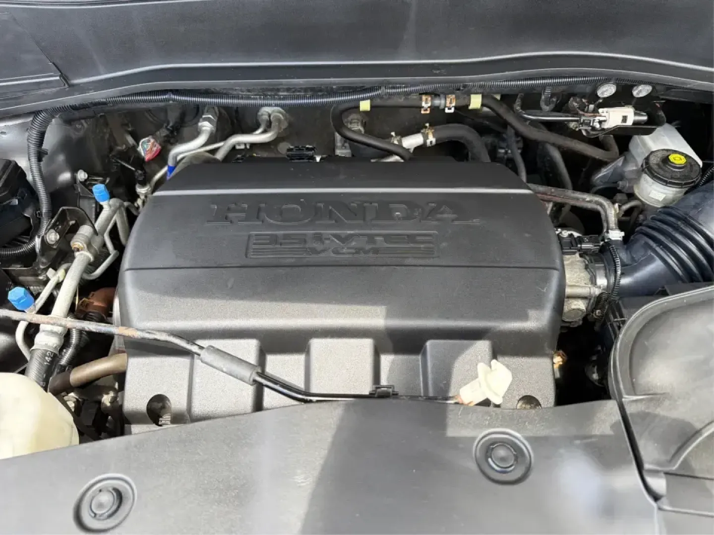 2012 Honda Pilot EX 4WD 5-Spd AT (5FNYF4H46CB) with an 3.5L V6 SOHC 24V engine, 5-Speed Automatic transmission, located at 401 Woodman Dr, Riverside, OH, 45431, (937) 908-9800, 39.760899, -84.123421 - Picture your next Ohio weekend: the kids packed up, coolers in the back, and plenty of room for friends-then cruising from Piqua to Indian Lake or over to Dayton without feeling cramped. This 2012 Honda Pilot EX 4WD is built for real life, whether you're tackling school drop-offs, long commutes on I - Photo#11