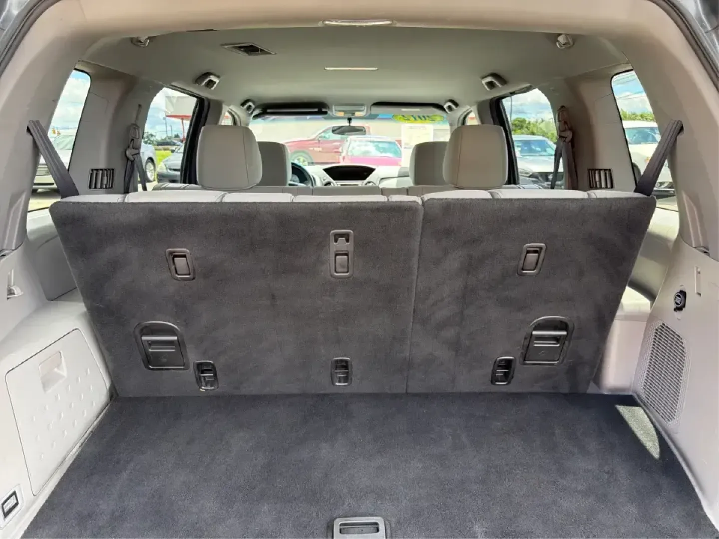 2012 Honda Pilot EX 4WD 5-Spd AT (5FNYF4H46CB) with an 3.5L V6 SOHC 24V engine, 5-Speed Automatic transmission, located at 401 Woodman Dr, Riverside, OH, 45431, (937) 908-9800, 39.760899, -84.123421 - Picture your next Ohio weekend: the kids packed up, coolers in the back, and plenty of room for friends-then cruising from Piqua to Indian Lake or over to Dayton without feeling cramped. This 2012 Honda Pilot EX 4WD is built for real life, whether you're tackling school drop-offs, long commutes on I - Photo#12
