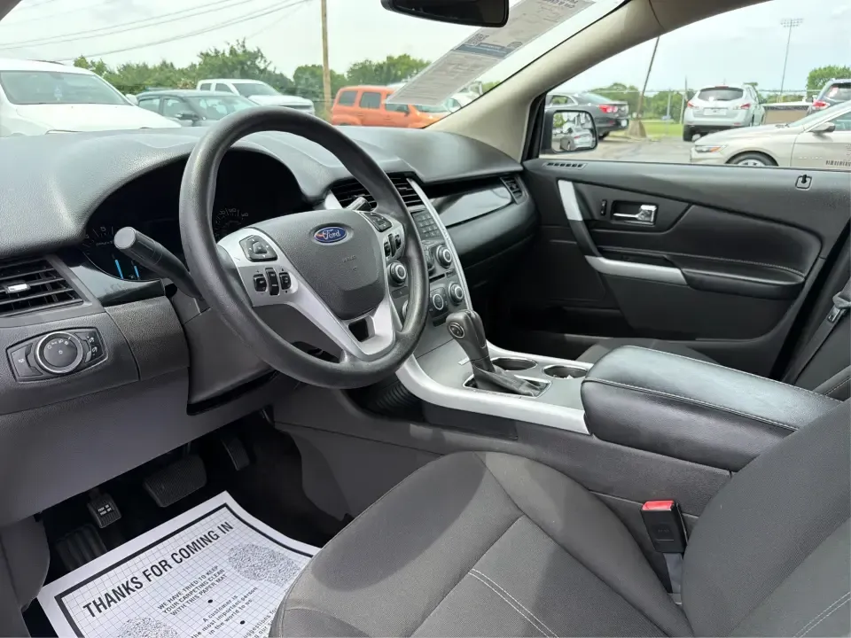 2014 Ford Edge SE FWD (2FMDK3GC0EB) with an 3.5L V6 DOHC 24V engine, 6-Speed Automatic transmission, located at 880 E. National Road, Vandalia, OH, 45377, (937) 908-9800, 39.891918, -84.183594 - Need an SUV that fits real life in the Miami Valley-school drop-offs, a steady commute, and weekend errands-without feeling bulky or hard to park? This 2014 Ford Edge SE FWD is a smart, comfortable choice for everyday drivers who want roomy seating for five, useful tech, and confident road manners f - Photo#9