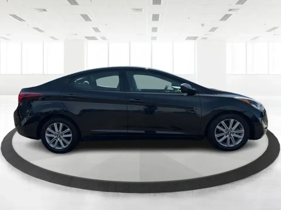 2016 Hyundai Elantra Limited (5NPDH4AE8GH) with an 1.8L L4 DOHC 16V engine, 6-Speed Automatic transmission, located at 4508 South Dixie Dr, Moraine, OH, 45439, (937) 908-9800, 39.689976, -84.218452 - Picture an easy weekday routine: a comfortable, fuel-sipping sedan for the commute down South Dixie Drive, quick school drop-offs, and a smooth Friday escape to Carillon Historical Park or a Dayton Dragons game. This **2016 Hyundai Elantra Limited** in **Phantom Black** is the kind of practical, pol - Photo#1