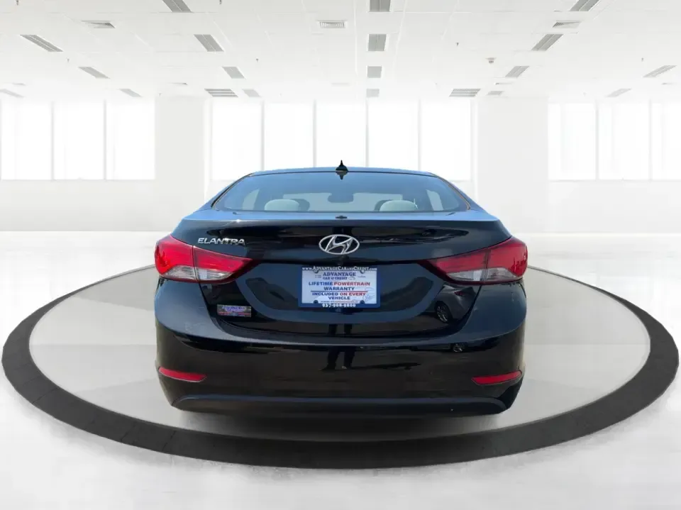 2016 Hyundai Elantra Limited (5NPDH4AE8GH) with an 1.8L L4 DOHC 16V engine, 6-Speed Automatic transmission, located at 4508 South Dixie Dr, Moraine, OH, 45439, (937) 908-9800, 39.689976, -84.218452 - Picture an easy weekday routine: a comfortable, fuel-sipping sedan for the commute down South Dixie Drive, quick school drop-offs, and a smooth Friday escape to Carillon Historical Park or a Dayton Dragons game. This **2016 Hyundai Elantra Limited** in **Phantom Black** is the kind of practical, pol - Photo#3