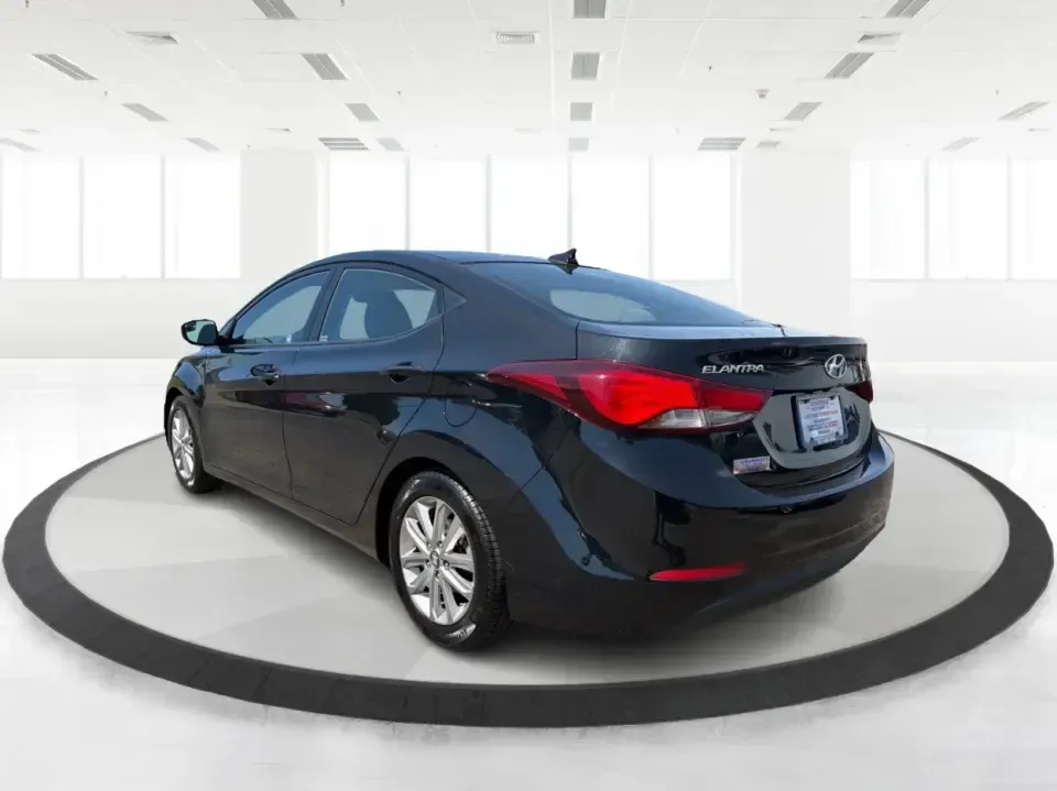 2016 Hyundai Elantra Limited (5NPDH4AE8GH) with an 1.8L L4 DOHC 16V engine, 6-Speed Automatic transmission, located at 4508 South Dixie Dr, Moraine, OH, 45439, (937) 908-9800, 39.689976, -84.218452 - Picture an easy weekday routine: a comfortable, fuel-sipping sedan for the commute down South Dixie Drive, quick school drop-offs, and a smooth Friday escape to Carillon Historical Park or a Dayton Dragons game. This **2016 Hyundai Elantra Limited** in **Phantom Black** is the kind of practical, pol - Photo#4