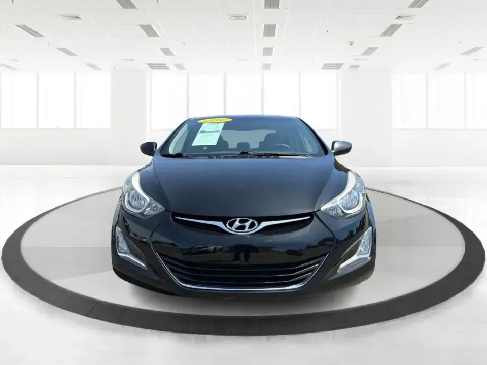 2016 Hyundai Elantra Limited (5NPDH4AE8GH) with an 1.8L L4 DOHC 16V engine, 6-Speed Automatic transmission, located at 4508 South Dixie Dr, Moraine, OH, 45439, (937) 908-9800, 39.689976, -84.218452 - Picture an easy weekday routine: a comfortable, fuel-sipping sedan for the commute down South Dixie Drive, quick school drop-offs, and a smooth Friday escape to Carillon Historical Park or a Dayton Dragons game. This **2016 Hyundai Elantra Limited** in **Phantom Black** is the kind of practical, pol - Photo#7