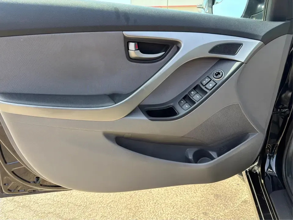 2016 Hyundai Elantra Limited (5NPDH4AE8GH) with an 1.8L L4 DOHC 16V engine, 6-Speed Automatic transmission, located at 4508 South Dixie Dr, Moraine, OH, 45439, (937) 908-9800, 39.689976, -84.218452 - Picture an easy weekday routine: a comfortable, fuel-sipping sedan for the commute down South Dixie Drive, quick school drop-offs, and a smooth Friday escape to Carillon Historical Park or a Dayton Dragons game. This **2016 Hyundai Elantra Limited** in **Phantom Black** is the kind of practical, pol - Photo#19