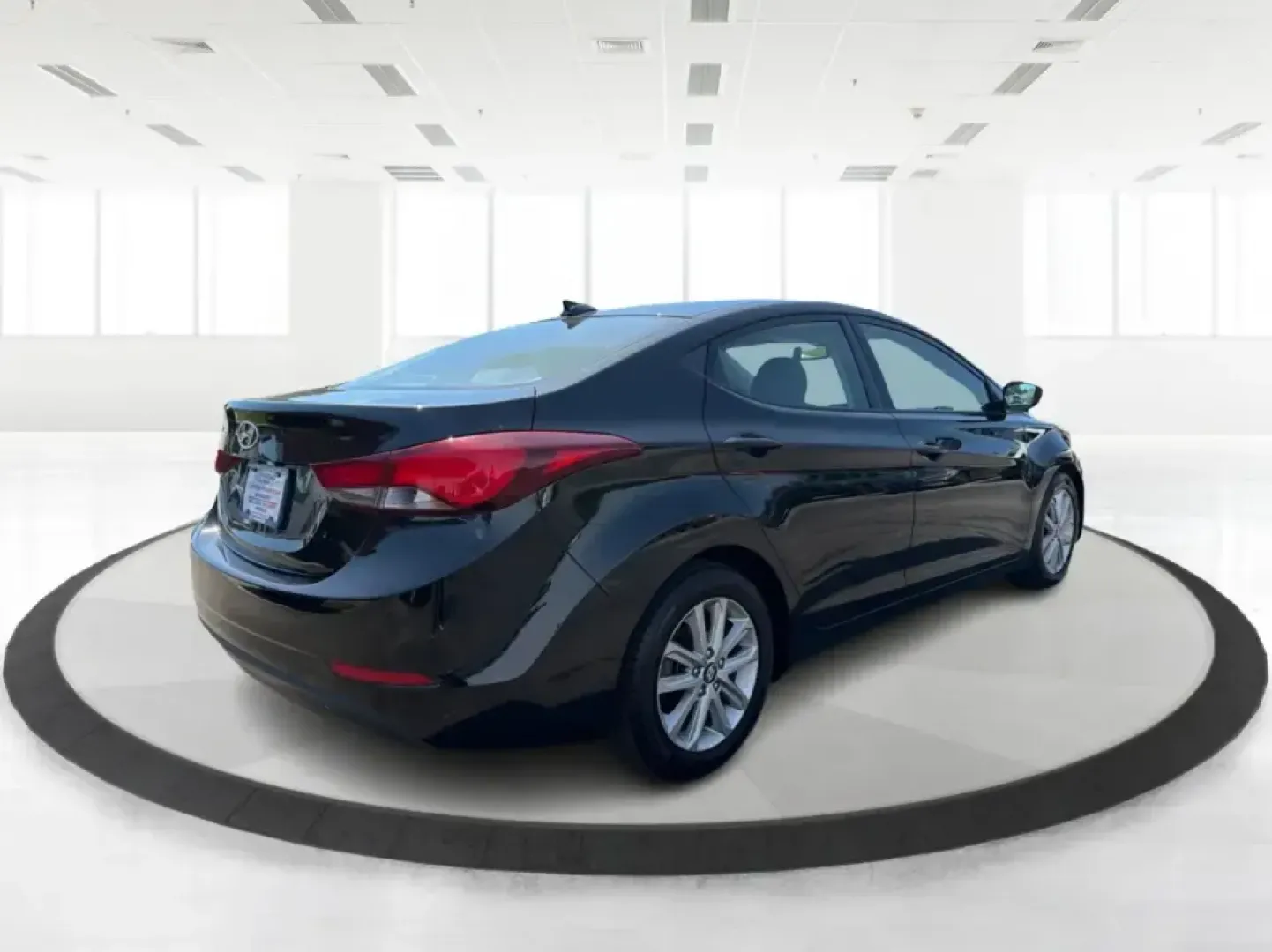 2016 Hyundai Elantra Limited (5NPDH4AE8GH) with an 1.8L L4 DOHC 16V engine, 6-Speed Automatic transmission, located at 1230 East Main St, Xenia, OH, 45385, (937) 908-9800, 39.688026, -83.910172 - Need a dependable commuter that still feels upscale for date night in downtown Xenia, quick school drop-offs, and weekend runs to Caesar Creek? This 2016 Hyundai Elantra Limited in Phantom Black is a smart, budget-friendly sedan built for daily life in Greene County-easy to park, comfortable for fiv- Photo#2