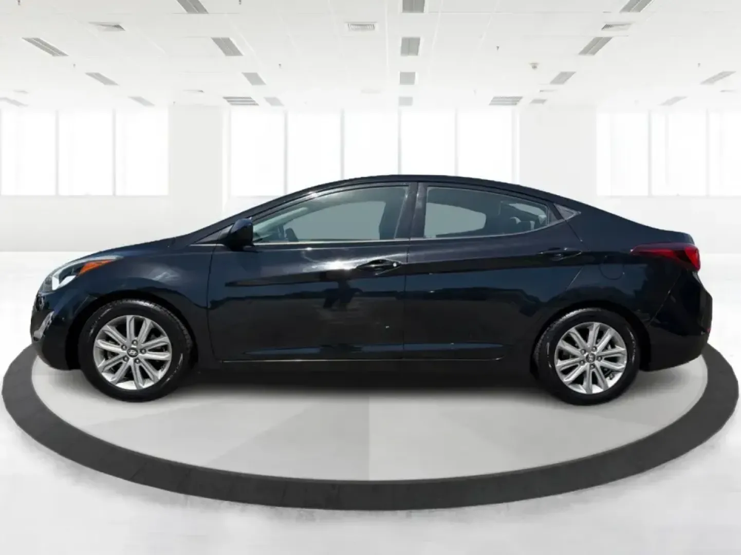 2016 Hyundai Elantra Limited (5NPDH4AE8GH) with an 1.8L L4 DOHC 16V engine, 6-Speed Automatic transmission, located at 1230 East Main St, Xenia, OH, 45385, (937) 908-9800, 39.688026, -83.910172 - Need a dependable commuter that still feels upscale for date night in downtown Xenia, quick school drop-offs, and weekend runs to Caesar Creek? This 2016 Hyundai Elantra Limited in Phantom Black is a smart, budget-friendly sedan built for daily life in Greene County-easy to park, comfortable for fiv- Photo#5