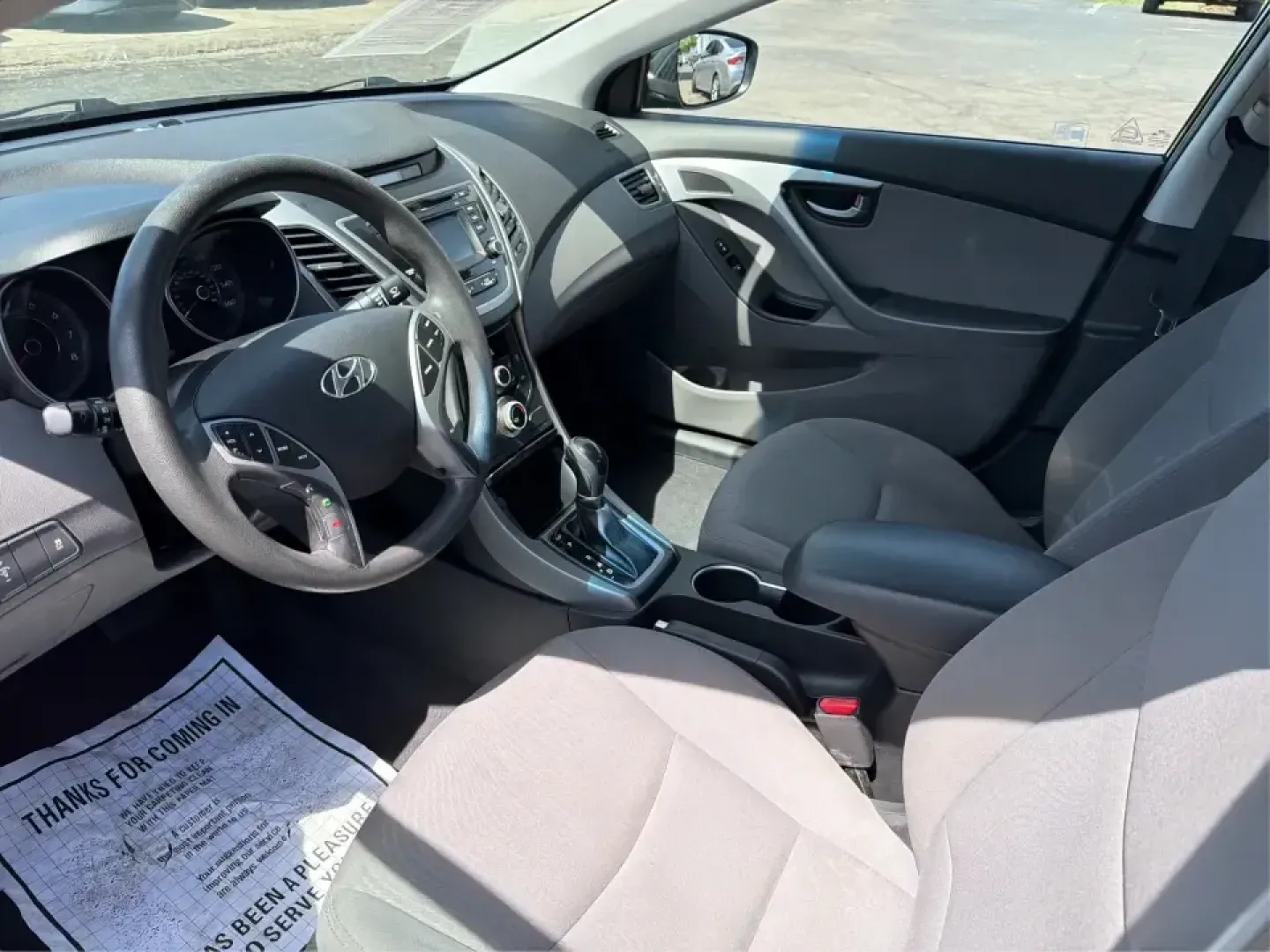 2016 Hyundai Elantra Limited (5NPDH4AE8GH) with an 1.8L L4 DOHC 16V engine, 6-Speed Automatic transmission, located at 1230 East Main St, Xenia, OH, 45385, (937) 908-9800, 39.688026, -83.910172 - Need a dependable commuter that still feels upscale for date night in downtown Xenia, quick school drop-offs, and weekend runs to Caesar Creek? This 2016 Hyundai Elantra Limited in Phantom Black is a smart, budget-friendly sedan built for daily life in Greene County-easy to park, comfortable for fiv- Photo#9