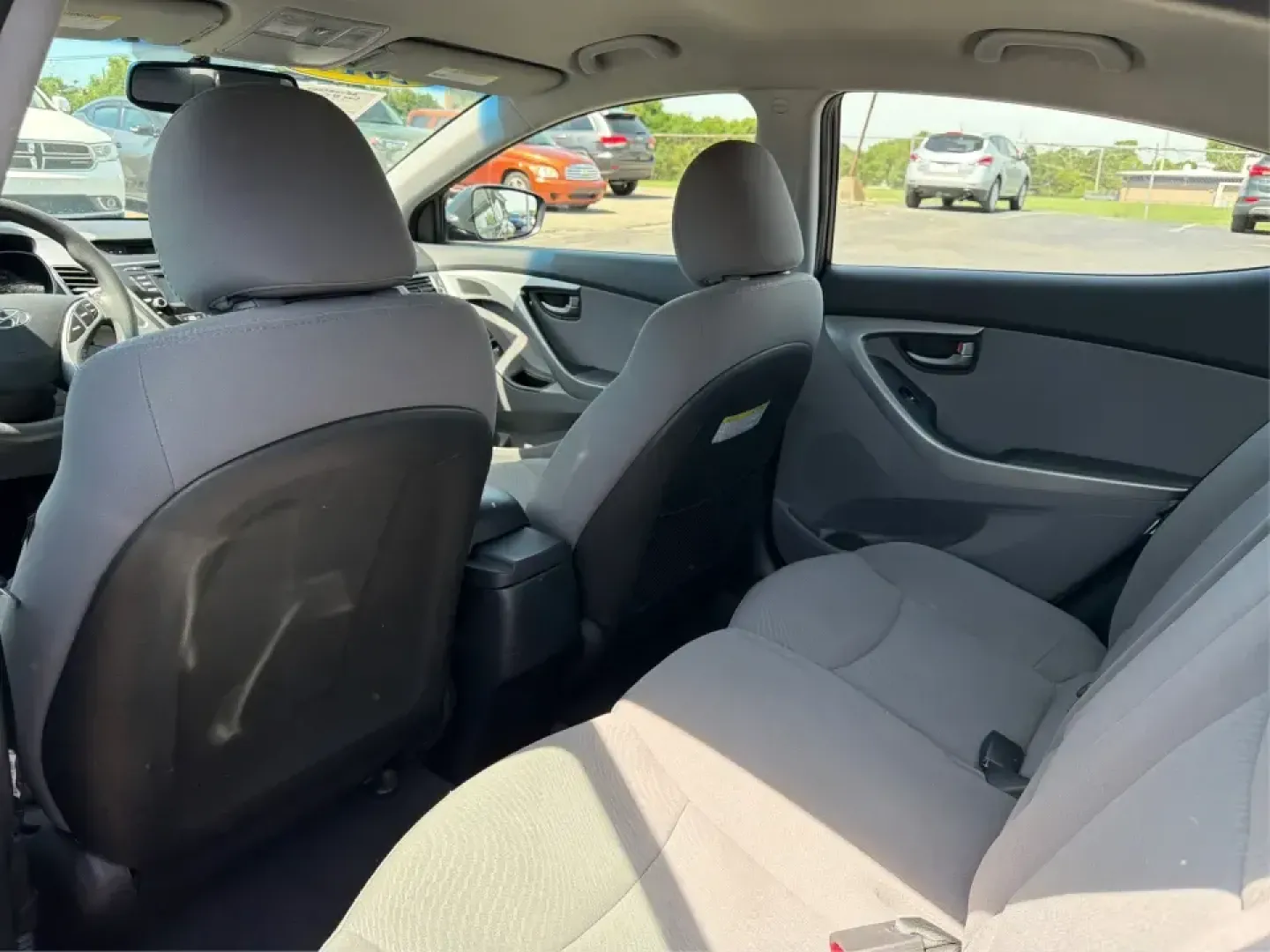 2016 Hyundai Elantra Limited (5NPDH4AE8GH) with an 1.8L L4 DOHC 16V engine, 6-Speed Automatic transmission, located at 1230 East Main St, Xenia, OH, 45385, (937) 908-9800, 39.688026, -83.910172 - Need a dependable commuter that still feels upscale for date night in downtown Xenia, quick school drop-offs, and weekend runs to Caesar Creek? This 2016 Hyundai Elantra Limited in Phantom Black is a smart, budget-friendly sedan built for daily life in Greene County-easy to park, comfortable for fiv- Photo#10