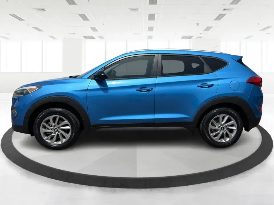 2016 Hyundai Tucson SE w/Preferred Package AWD (KM8J3CA41GU) with an 2.0L L4 DOHC 16V engine, 6A transmission, located at 401 Woodman Dr, Riverside, OH, 45431, (937) 908-9800, 39.760899, -84.123421 - Need an SUV that can handle Dayton-area commutes, rainy school drop-offs, and spontaneous weekend getaways without feeling oversized? This 2016 Hyundai Tucson SE w/Preferred Package AWD in eye-catching Caribbean Blue is built for real life-comfortable for daily drives, confident when the weather tur - Photo#5