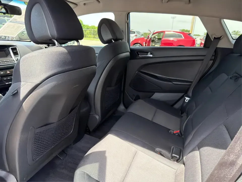 2016 Hyundai Tucson SE w/Preferred Package AWD (KM8J3CA41GU) with an 2.0L L4 DOHC 16V engine, 6A transmission, located at 401 Woodman Dr, Riverside, OH, 45431, (937) 908-9800, 39.760899, -84.123421 - Need an SUV that can handle Dayton-area commutes, rainy school drop-offs, and spontaneous weekend getaways without feeling oversized? This 2016 Hyundai Tucson SE w/Preferred Package AWD in eye-catching Caribbean Blue is built for real life-comfortable for daily drives, confident when the weather tur - Photo#10