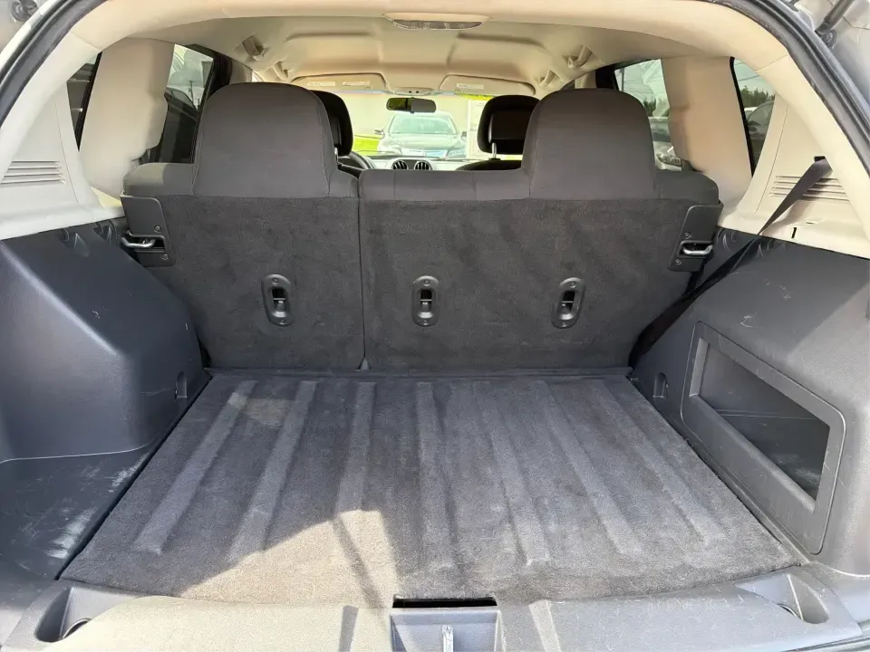 2015 Jeep Compass Sport FWD (1C4NJCBA6FD) with an 2.0L L4 DOHC 16V engine, located at 880 E. National Road, Vandalia, OH, 45377, (937) 908-9800, 39.891918, -84.183594 - Weekday commutes down I75, school drop-offs in Butler Township, and quick weekend getaways to the National Museum of the U.S. Air Force or Taylorsville MetroPark all call for an SUV that's easy to live with, comfortable for five, and efficient enough to keep your budget in check. This **2015 Jeep Co - Photo#12