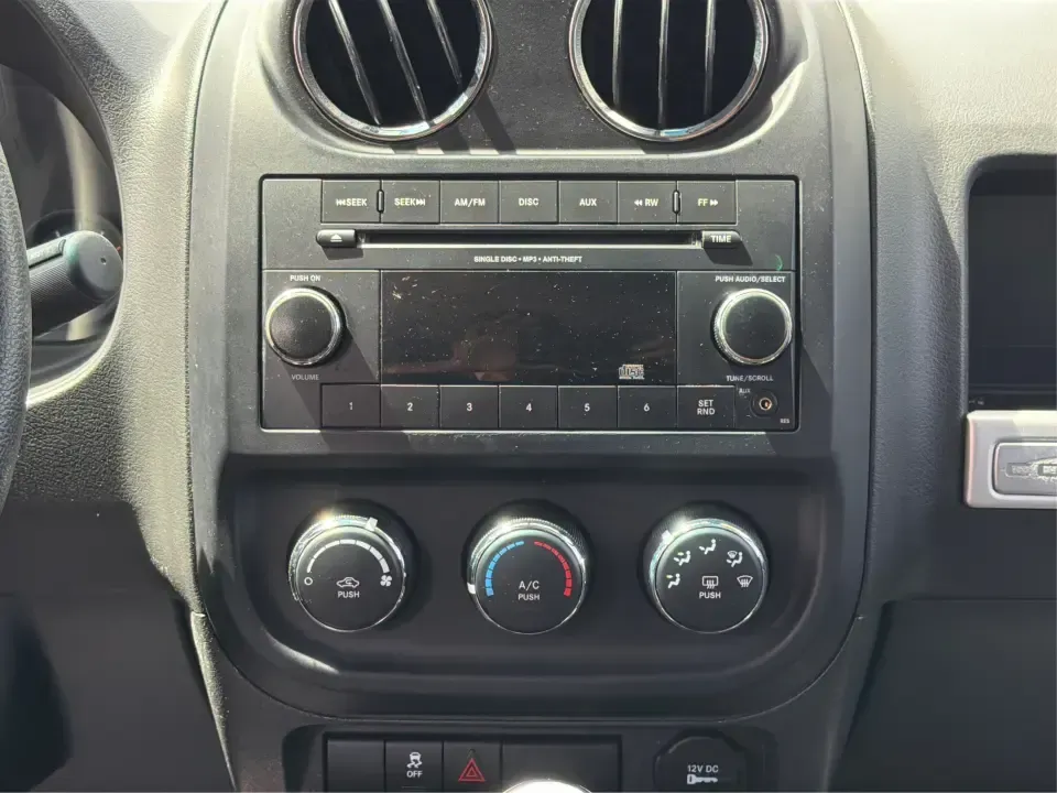 2015 Jeep Compass Sport FWD (1C4NJCBA6FD) with an 2.0L L4 DOHC 16V engine, located at 880 E. National Road, Vandalia, OH, 45377, (937) 908-9800, 39.891918, -84.183594 - Weekday commutes down I75, school drop-offs in Butler Township, and quick weekend getaways to the National Museum of the U.S. Air Force or Taylorsville MetroPark all call for an SUV that's easy to live with, comfortable for five, and efficient enough to keep your budget in check. This **2015 Jeep Co - Photo#13