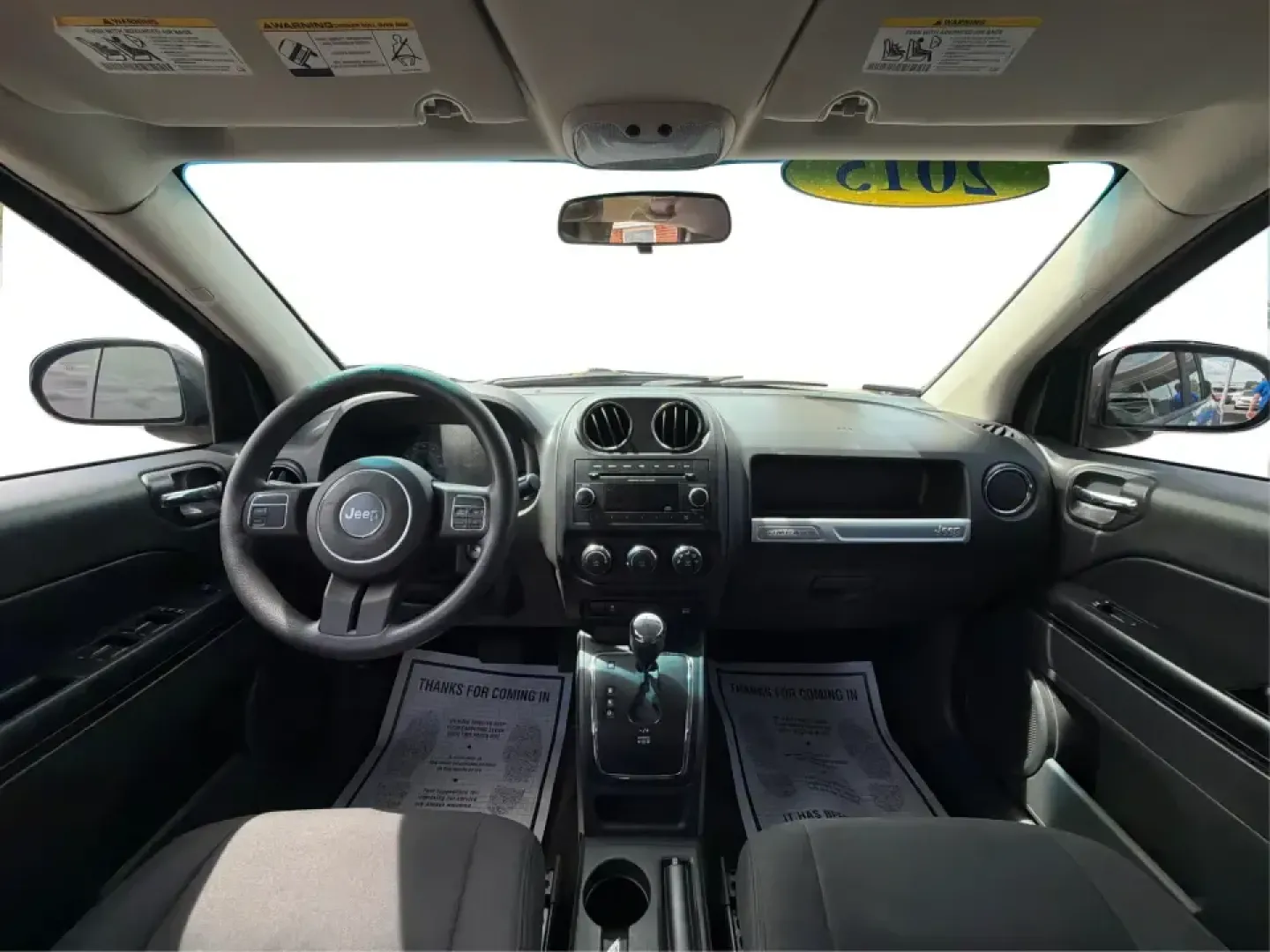 2015 Jeep Compass Sport FWD (1C4NJCBA6FD) with an 2.0L L4 DOHC 16V engine, located at 1951 S Dayton Lakeview Rd., New Carlisle, OH, 45344, (937) 908-9800, 39.890999, -84.050255 - Whether your week looks like a daily commute down I70, school drop-offs around Clark County, or a quick weekend escape to Buck Creek State Park, this **2015 Jeep Compass Sport FWD** is the kind of compact SUV that fits real life. With seating for **five**, easy-to-park sizing, and the versatile carg- Photo#20