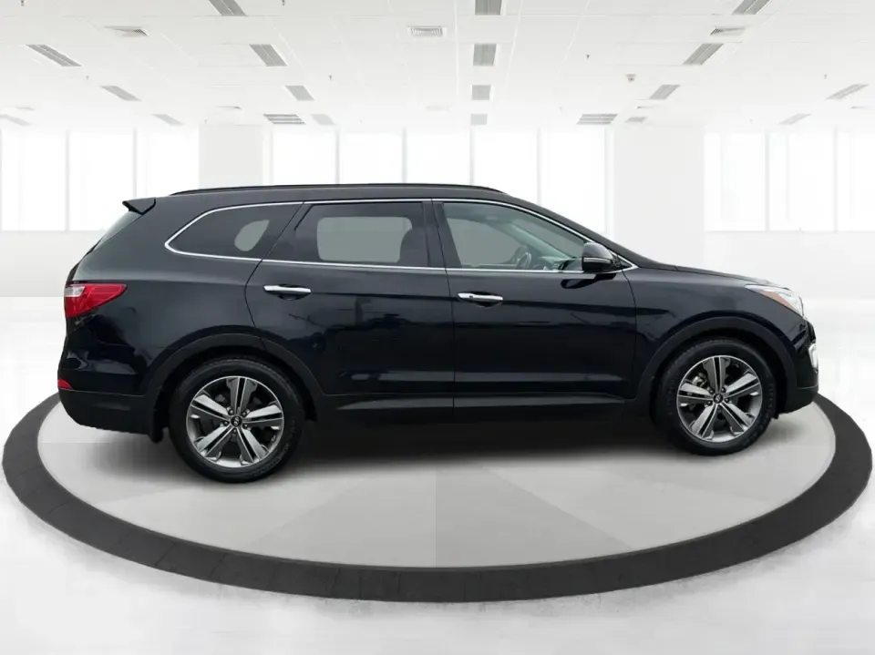 2014 Hyundai Santa Fe Limited AWD (KM8SRDHF4EU) with an 3.3L V6 DOHC 24V engine, 6-Speed Automatic transmission, located at 1230 East Main St, Xenia, OH, 45385, (937) 908-9800, 39.688026, -83.910172 - Picture your next weekend: loading up the family for a day at John Bryan State Park, heading out for youth sports in Beavercreek, or cruising I35 and US68 for an easy commute to Dayton. This 2014 Hyundai Santa Fe Limited AWD is built for real life in and around Xenia-roomy enough for growing familie - Photo#1