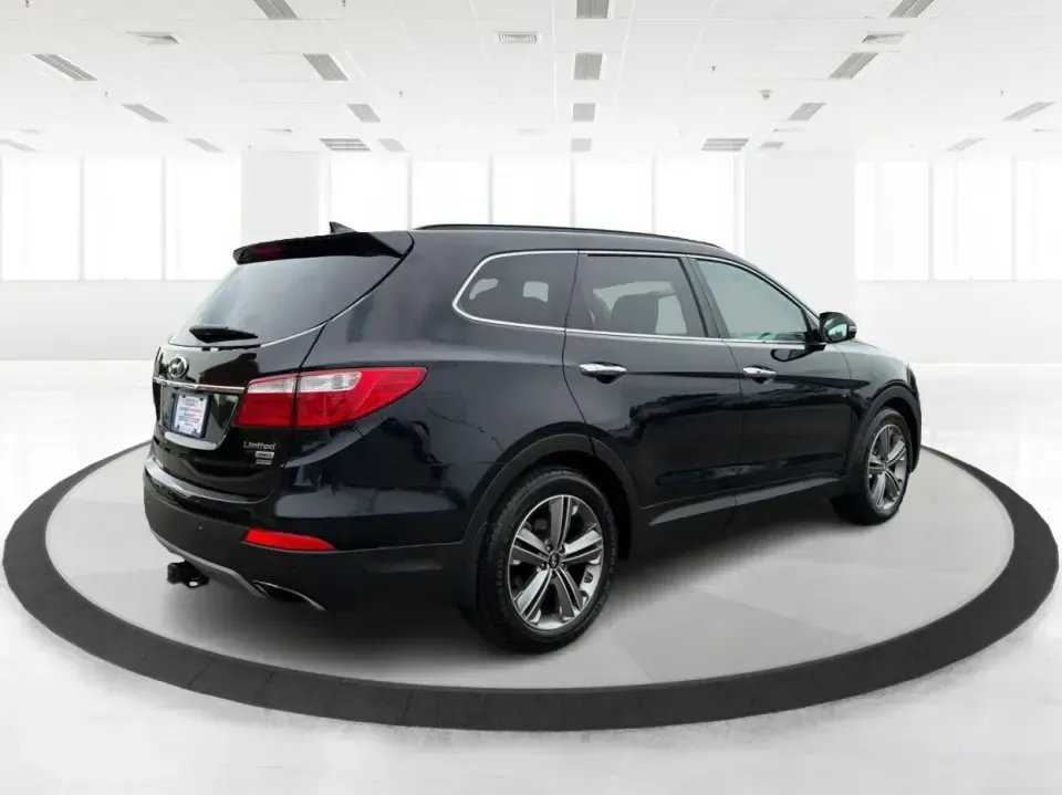 2014 Hyundai Santa Fe Limited AWD (KM8SRDHF4EU) with an 3.3L V6 DOHC 24V engine, 6-Speed Automatic transmission, located at 1230 East Main St, Xenia, OH, 45385, (937) 908-9800, 39.688026, -83.910172 - Picture your next weekend: loading up the family for a day at John Bryan State Park, heading out for youth sports in Beavercreek, or cruising I35 and US68 for an easy commute to Dayton. This 2014 Hyundai Santa Fe Limited AWD is built for real life in and around Xenia-roomy enough for growing familie - Photo#2
