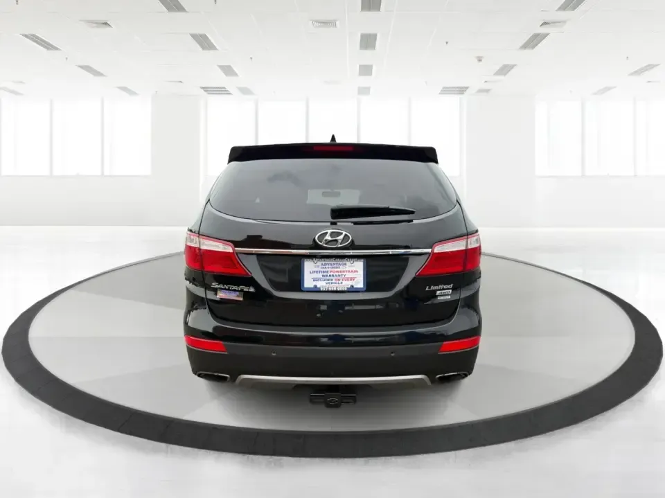 2014 Hyundai Santa Fe Limited AWD (KM8SRDHF4EU) with an 3.3L V6 DOHC 24V engine, 6-Speed Automatic transmission, located at 1230 East Main St, Xenia, OH, 45385, (937) 908-9800, 39.688026, -83.910172 - Picture your next weekend: loading up the family for a day at John Bryan State Park, heading out for youth sports in Beavercreek, or cruising I35 and US68 for an easy commute to Dayton. This 2014 Hyundai Santa Fe Limited AWD is built for real life in and around Xenia-roomy enough for growing familie - Photo#3