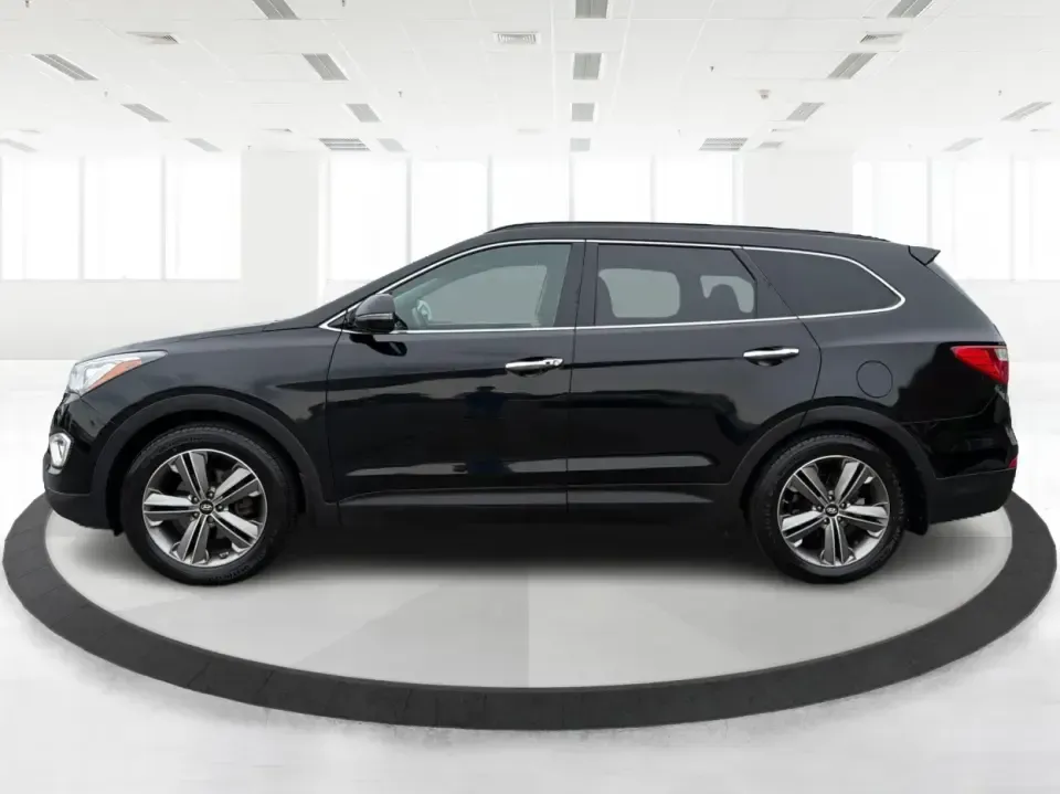 2014 Hyundai Santa Fe Limited AWD (KM8SRDHF4EU) with an 3.3L V6 DOHC 24V engine, 6-Speed Automatic transmission, located at 1230 East Main St, Xenia, OH, 45385, (937) 908-9800, 39.688026, -83.910172 - Picture your next weekend: loading up the family for a day at John Bryan State Park, heading out for youth sports in Beavercreek, or cruising I35 and US68 for an easy commute to Dayton. This 2014 Hyundai Santa Fe Limited AWD is built for real life in and around Xenia-roomy enough for growing familie - Photo#5