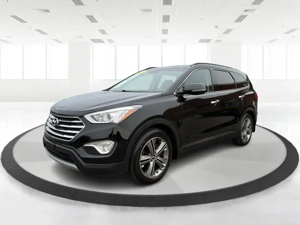 2014 Hyundai Santa Fe Limited AWD (KM8SRDHF4EU) with an 3.3L V6 DOHC 24V engine, 6-Speed Automatic transmission, located at 1230 East Main St, Xenia, OH, 45385, (937) 908-9800, 39.688026, -83.910172 - Picture your next weekend: loading up the family for a day at John Bryan State Park, heading out for youth sports in Beavercreek, or cruising I35 and US68 for an easy commute to Dayton. This 2014 Hyundai Santa Fe Limited AWD is built for real life in and around Xenia-roomy enough for growing familie - Photo#8