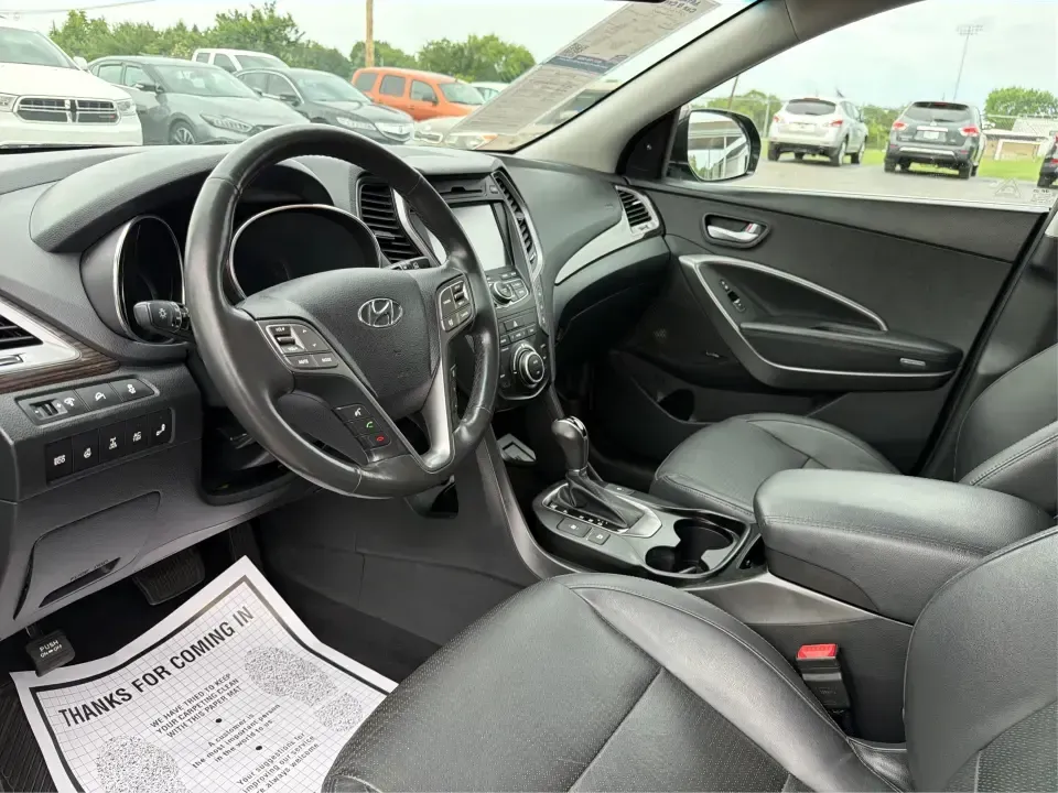 2014 Hyundai Santa Fe Limited AWD (KM8SRDHF4EU) with an 3.3L V6 DOHC 24V engine, 6-Speed Automatic transmission, located at 1230 East Main St, Xenia, OH, 45385, (937) 908-9800, 39.688026, -83.910172 - Picture your next weekend: loading up the family for a day at John Bryan State Park, heading out for youth sports in Beavercreek, or cruising I35 and US68 for an easy commute to Dayton. This 2014 Hyundai Santa Fe Limited AWD is built for real life in and around Xenia-roomy enough for growing familie - Photo#9
