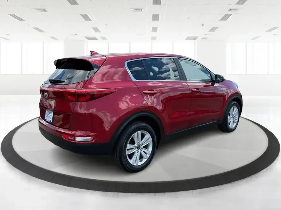 2018 Kia Sportage LX AWD (KNDPMCACXJ7) with an 2.4L V6 DOHC 24V engine, 6A transmission, located at 4508 South Dixie Dr, Moraine, OH, 45439, (937) 908-9800, 39.689976, -84.218452 - Need a capable crossover for Midwest weather, daily commutes, and spontaneous weekend plans-without the stress that can come with traditional lending? This **2018 Kia Sportage LX AWD** in bold **Hyper Red** fits an active Moraine/Dayton lifestyle, whether you're shuttling kids to practice, commuting - Photo#2
