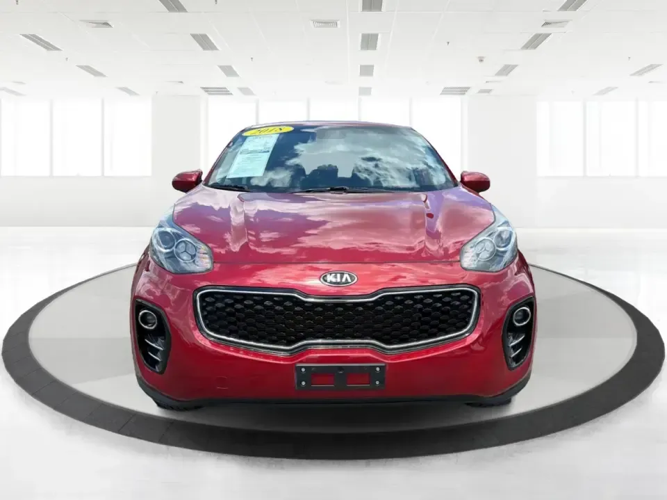 2018 Kia Sportage LX AWD (KNDPMCACXJ7) with an 2.4L V6 DOHC 24V engine, 6A transmission, located at 4508 South Dixie Dr, Moraine, OH, 45439, (937) 908-9800, 39.689976, -84.218452 - Need a capable crossover for Midwest weather, daily commutes, and spontaneous weekend plans-without the stress that can come with traditional lending? This **2018 Kia Sportage LX AWD** in bold **Hyper Red** fits an active Moraine/Dayton lifestyle, whether you're shuttling kids to practice, commuting - Photo#7