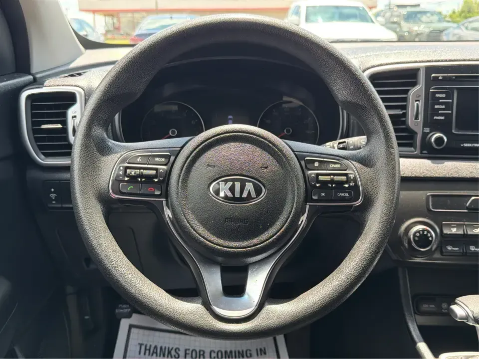 2018 Kia Sportage LX AWD (KNDPMCACXJ7) with an 2.4L V6 DOHC 24V engine, 6A transmission, located at 4508 South Dixie Dr, Moraine, OH, 45439, (937) 908-9800, 39.689976, -84.218452 - Need a capable crossover for Midwest weather, daily commutes, and spontaneous weekend plans-without the stress that can come with traditional lending? This **2018 Kia Sportage LX AWD** in bold **Hyper Red** fits an active Moraine/Dayton lifestyle, whether you're shuttling kids to practice, commuting - Photo#16