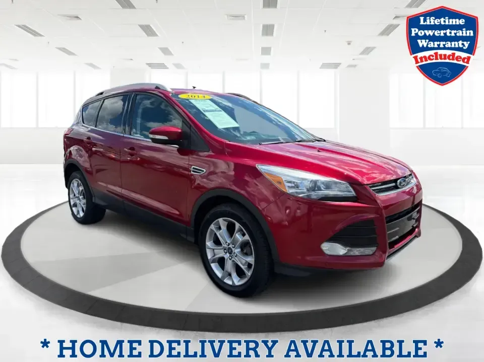2014 Ford Escape Titanium 4WD (1FMCU9J91EU) with an 2.0L L4 DOHC 16V engine, 6-Speed Automatic transmission, located at 1099 N County Rd 25A , Troy, OH, 45373, (937) 908-9800, 40.057079, -84.212883 - Weekend getaways to Hocking Hills, snowy commutes up I75, or the everyday school-and-grocery loop around Troy-this 2014 Ford Escape Titanium 4WD is built for the kind of life that doesn't slow down when the weather changes. With seating for five, flexible cargo space, and confident four-wheel drive,- Photo#0